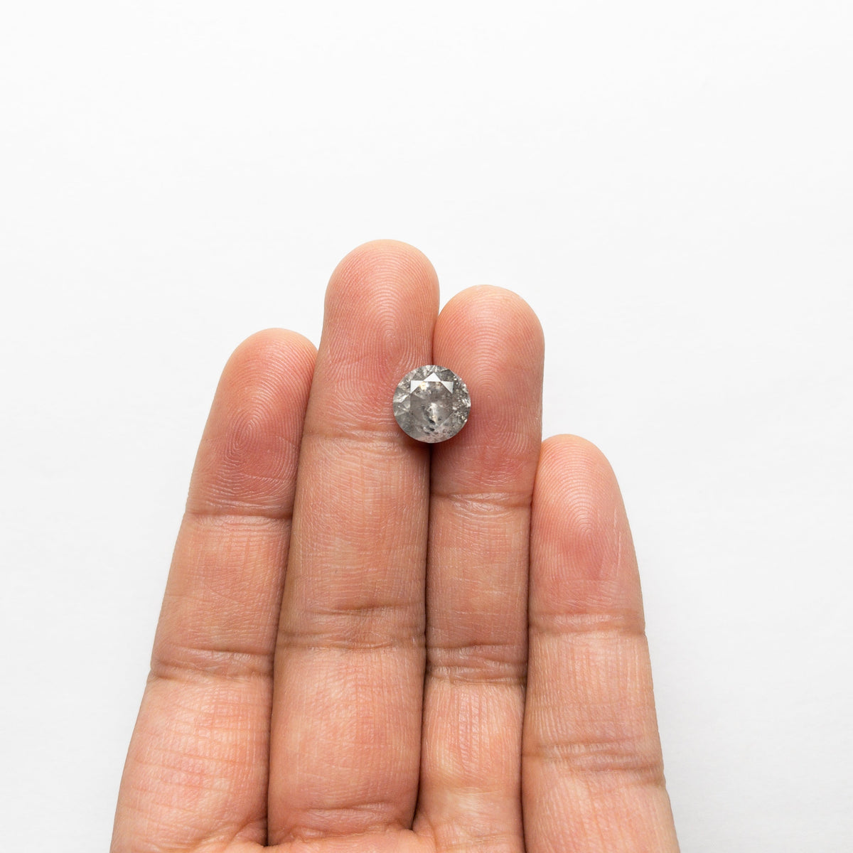 The 3.66ct 9.57x9.54x6.16mm Round Brilliant 18929-09 by East London jeweller Rachel Boston | Discover our collections of unique and timeless engagement rings, wedding rings, and modern fine jewellery.