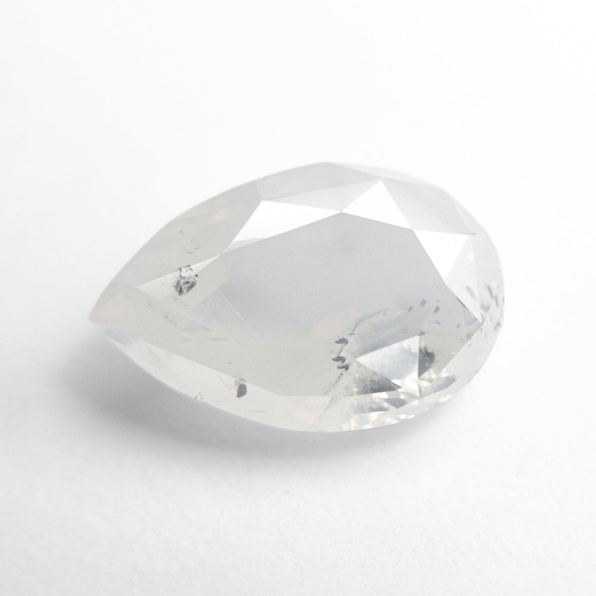 The 3.13ct 11.49x7.54x4.46mm Fancy White Pear Double Cut 18955-01 by East London jeweller Rachel Boston | Discover our collections of unique and timeless engagement rings, wedding rings, and modern fine jewellery.