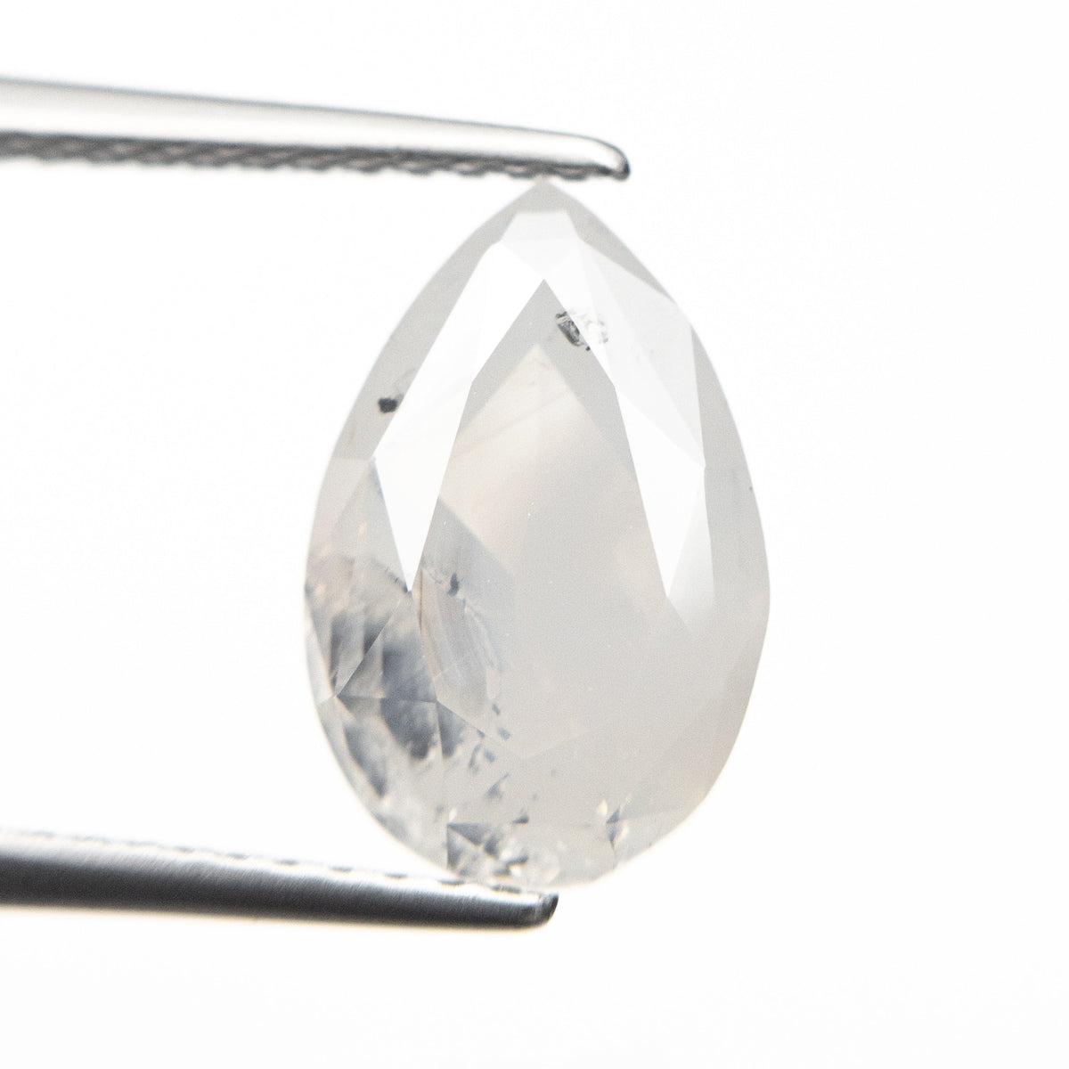 The 3.13ct 11.49x7.54x4.46mm Fancy White Pear Double Cut 18955-01 by East London jeweller Rachel Boston | Discover our collections of unique and timeless engagement rings, wedding rings, and modern fine jewellery.