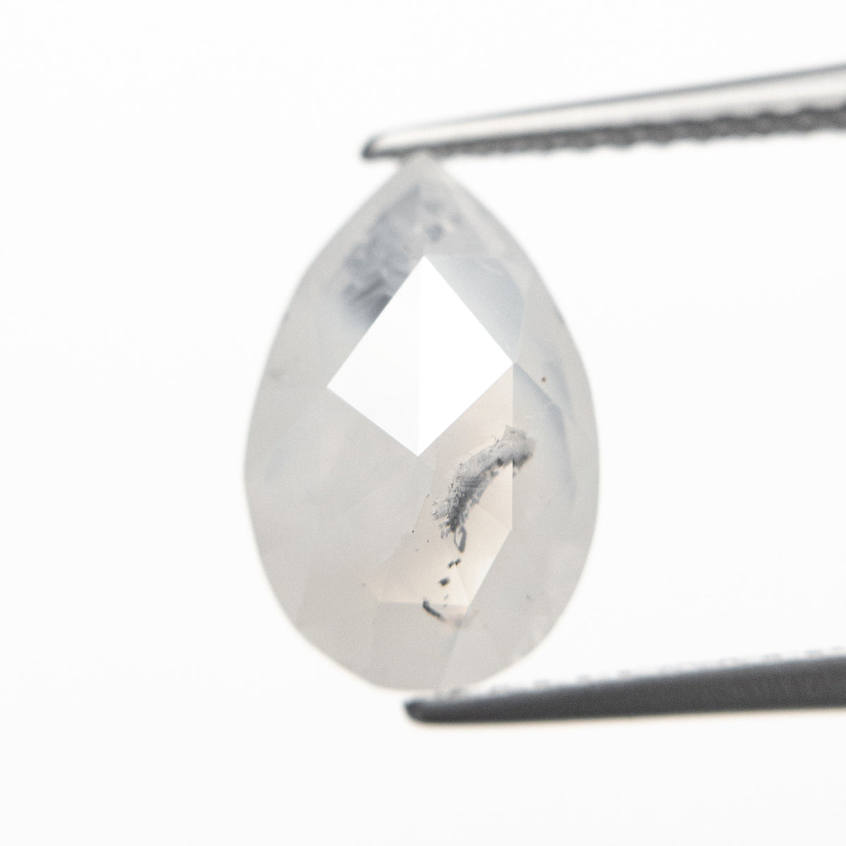 The 3.13ct 11.49x7.54x4.46mm Fancy White Pear Double Cut 18955-01 by East London jeweller Rachel Boston | Discover our collections of unique and timeless engagement rings, wedding rings, and modern fine jewellery.