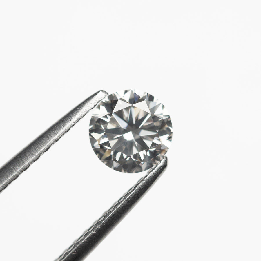 The 0.60ct 5.20x5.18x3.32mm Fancy Grey Round Brilliant 18968-21 by East London jeweller Rachel Boston | Discover our collections of unique and timeless engagement rings, wedding rings, and modern fine jewellery. - Rachel Boston Jewellery