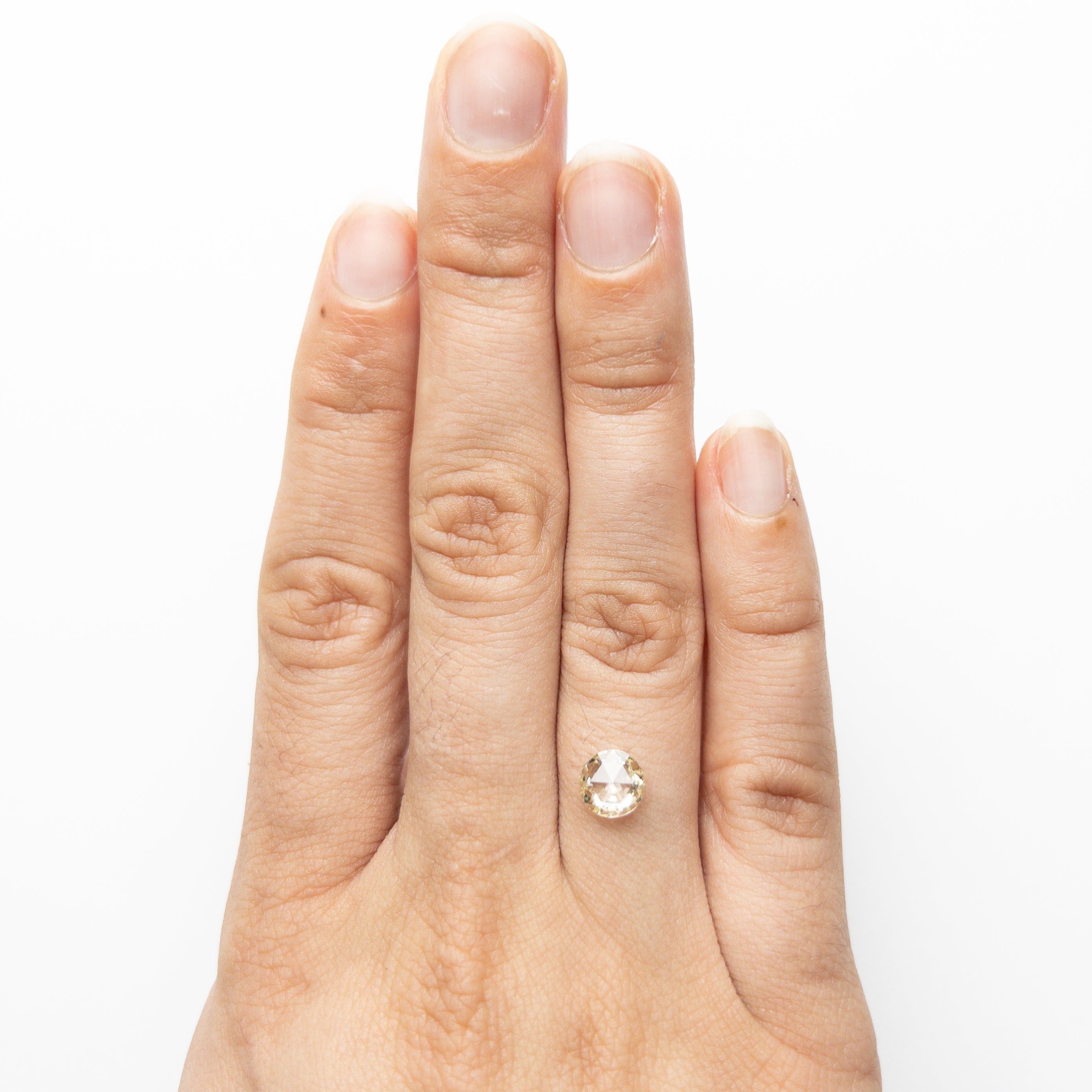 The 0.88ct 6.58x6.52x2.39mm I1 Q-R Round Double Cut 19017-08 by East London jeweller Rachel Boston | Discover our collections of unique and timeless engagement rings, wedding rings, and modern fine jewellery.