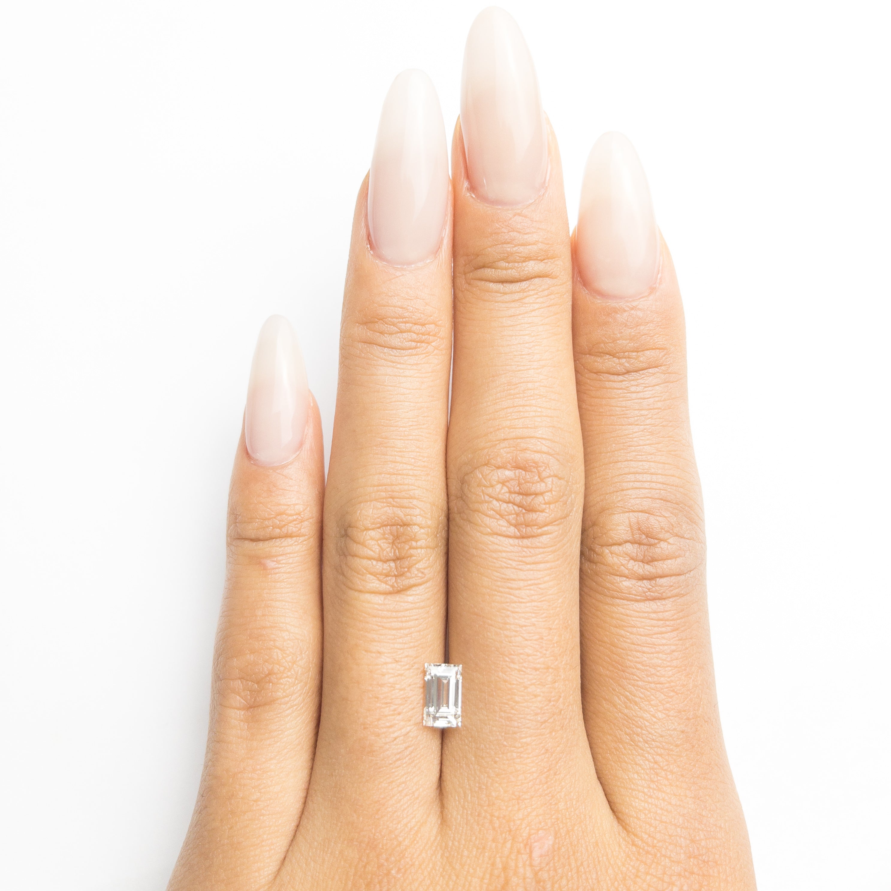 The 1.01ct 6.98x4.31x3.41mm VS1 I Baguette Step Cut 19136-04 by East London jeweller Rachel Boston | Discover our collections of unique and timeless engagement rings, wedding rings, and modern fine jewellery.