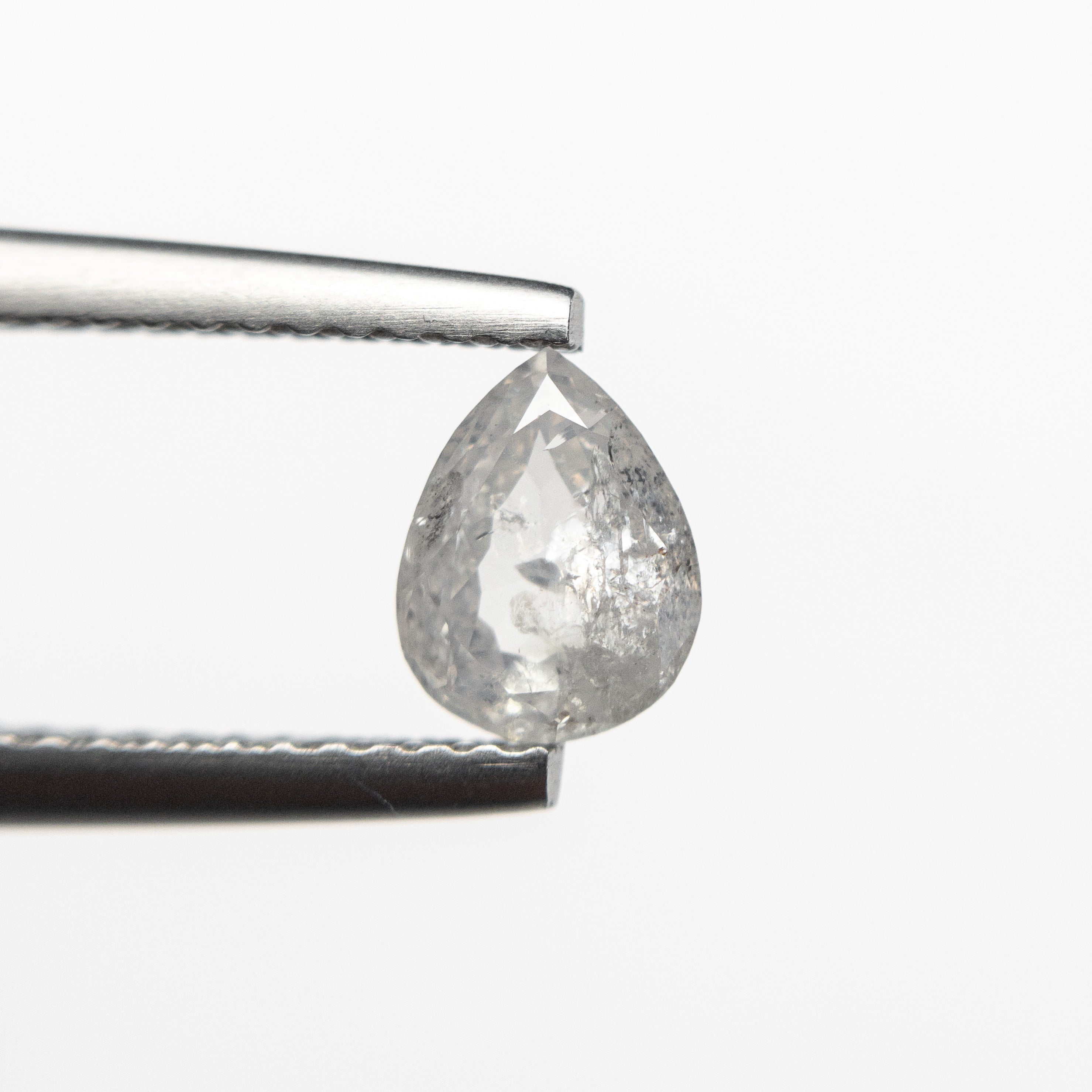 The 0.83ct 6.64x5.12x2.89mm Pear Double Cut 19143-11 by East London jeweller Rachel Boston | Discover our collections of unique and timeless engagement rings, wedding rings, and modern fine jewellery.