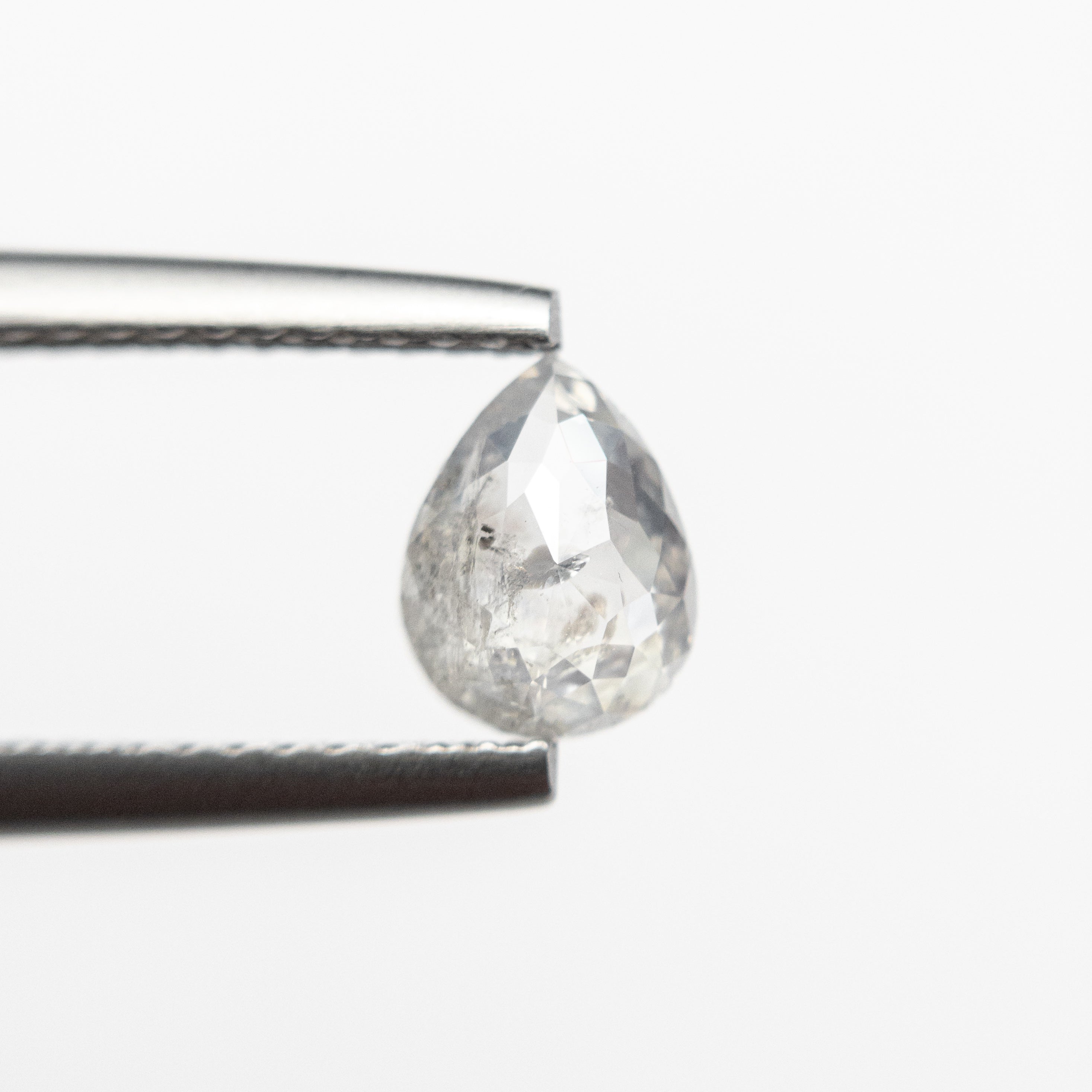 The 0.83ct 6.64x5.12x2.89mm Pear Double Cut 19143-11 by East London jeweller Rachel Boston | Discover our collections of unique and timeless engagement rings, wedding rings, and modern fine jewellery.