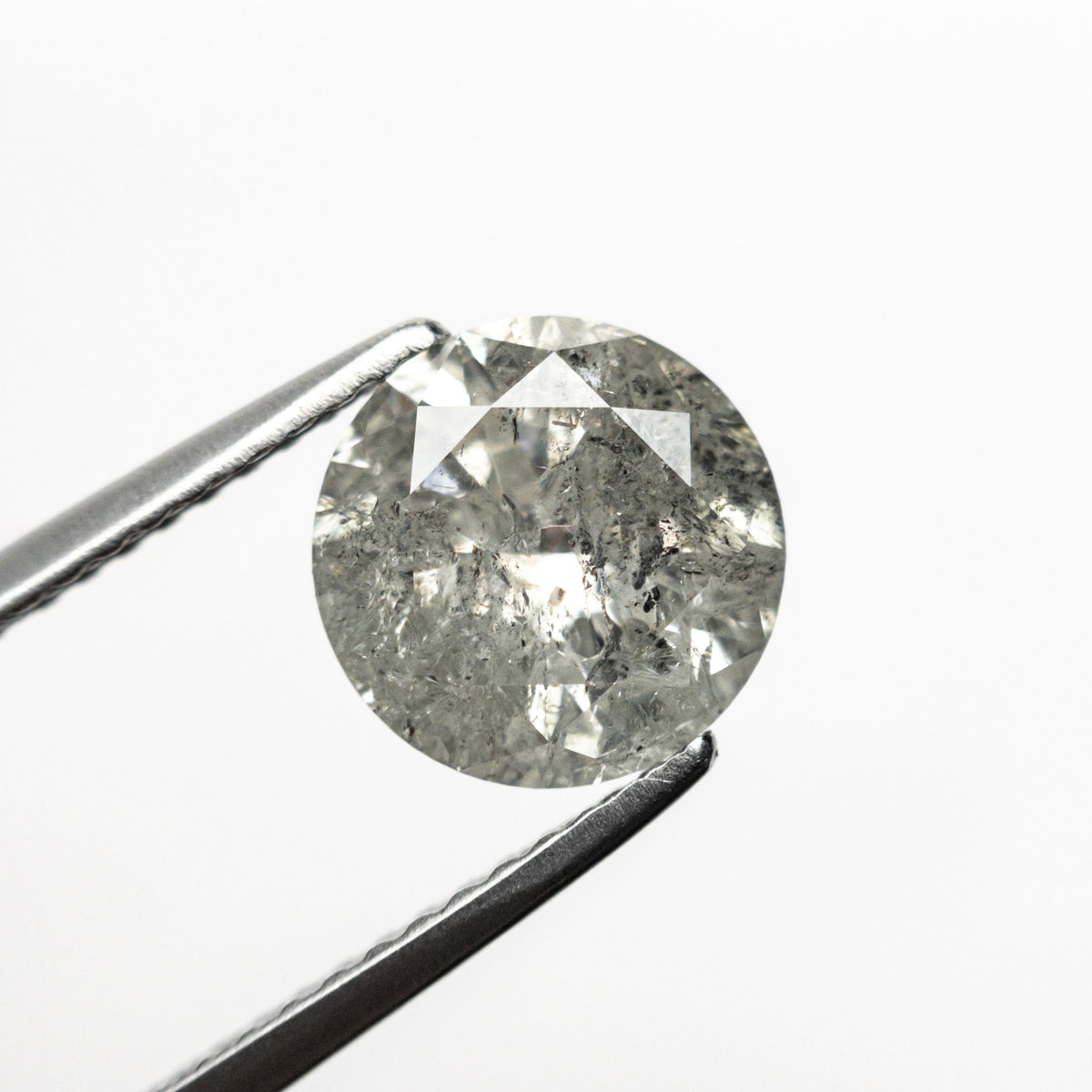 The 2.13ct 8.29x8.24x4.95mm Round Brilliant 19195-01 by East London jeweller Rachel Boston | Discover our collections of unique and timeless engagement rings, wedding rings, and modern fine jewellery.