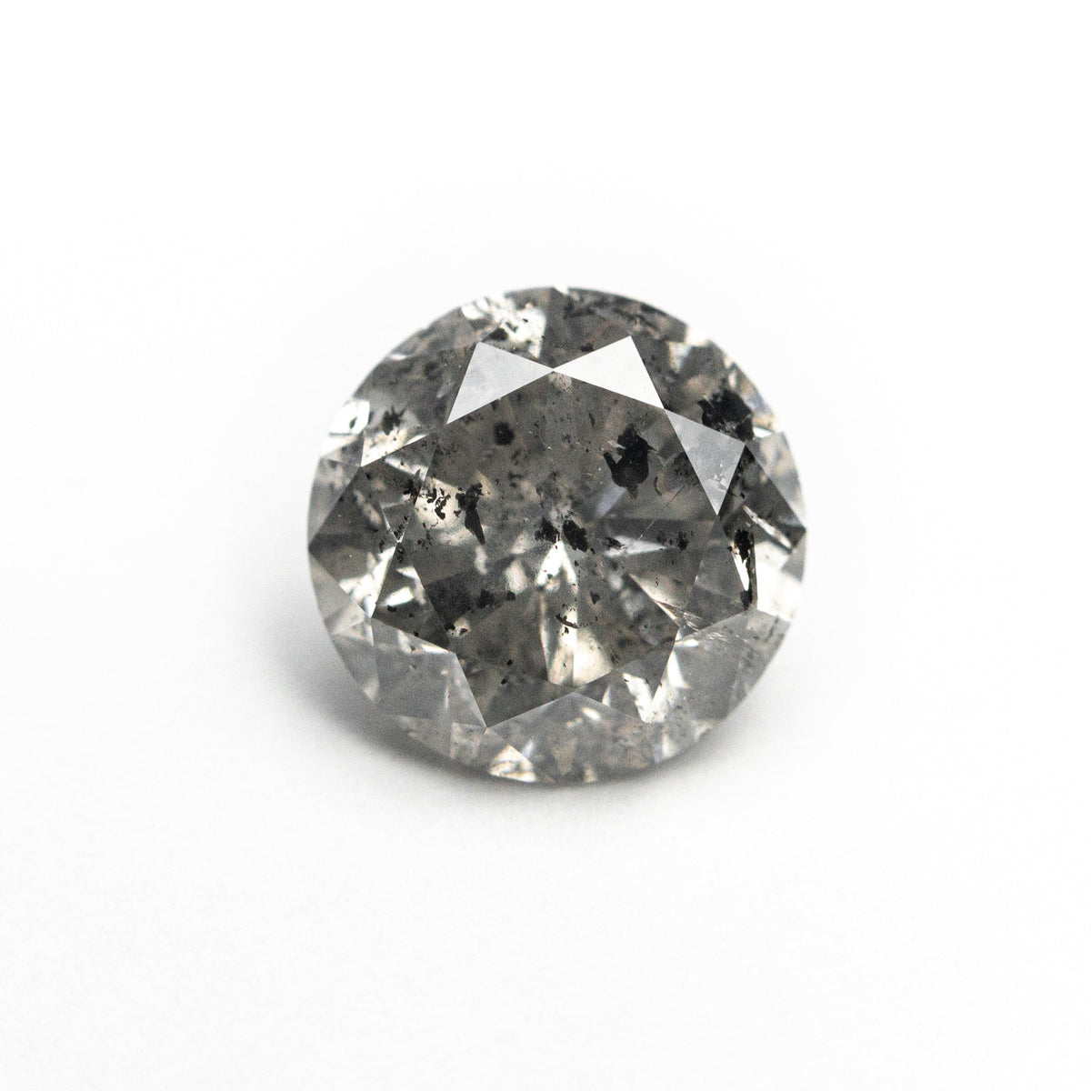 The 1.67ct 7.45x7.38x4.67mm Round Brilliant 19195-13 by East London jeweller Rachel Boston | Discover our collections of unique and timeless engagement rings, wedding rings, and modern fine jewellery.