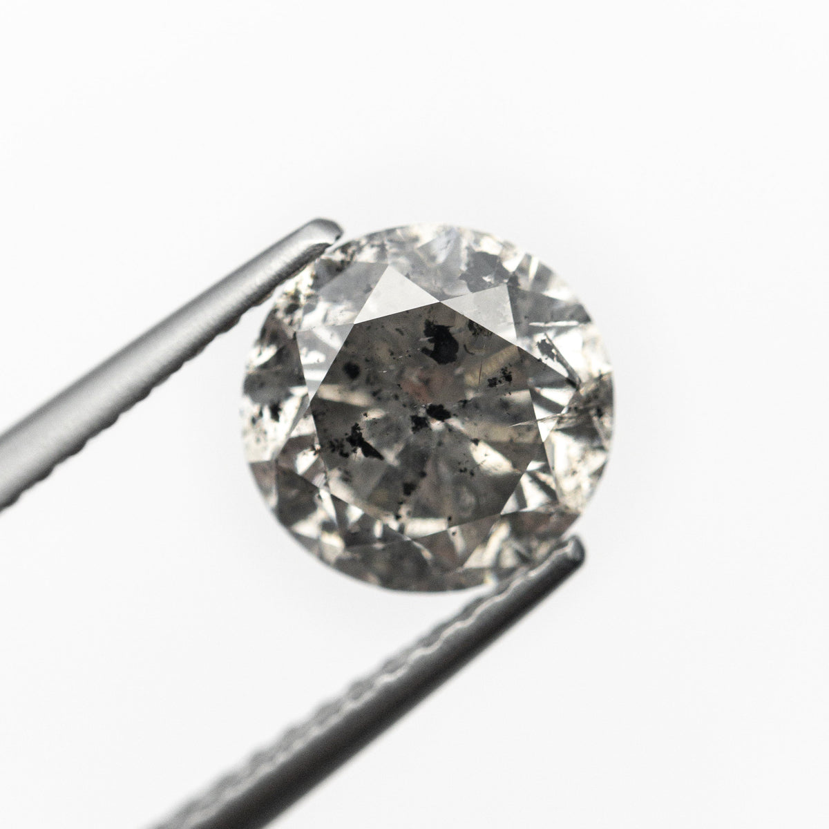 The 1.67ct 7.45x7.38x4.67mm Round Brilliant 19195-13 by East London jeweller Rachel Boston | Discover our collections of unique and timeless engagement rings, wedding rings, and modern fine jewellery.