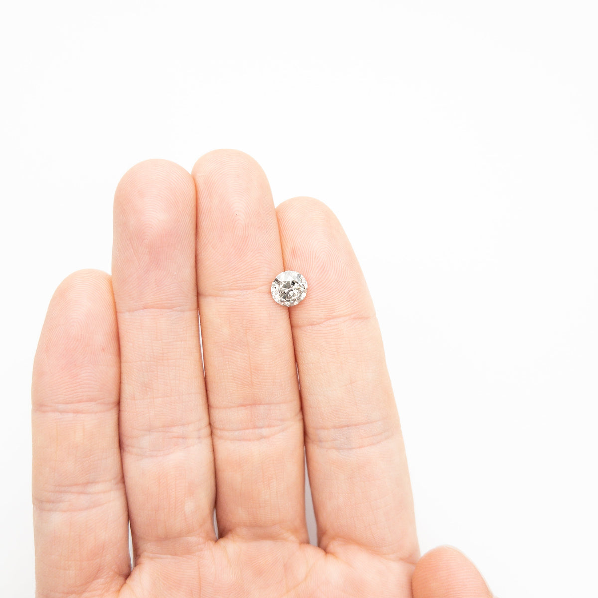 The 1.67ct 7.45x7.38x4.67mm Round Brilliant 19195-13 by East London jeweller Rachel Boston | Discover our collections of unique and timeless engagement rings, wedding rings, and modern fine jewellery.