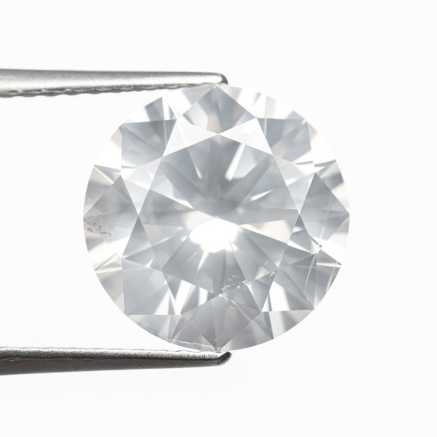 The 4.00ct 10.13x10.12x6.25mm GIA I2 Fancy White Round Brilliant 19263-01 by East London jeweller Rachel Boston | Discover our collections of unique and timeless engagement rings, wedding rings, and modern fine jewellery. - Rachel Boston Jewellery