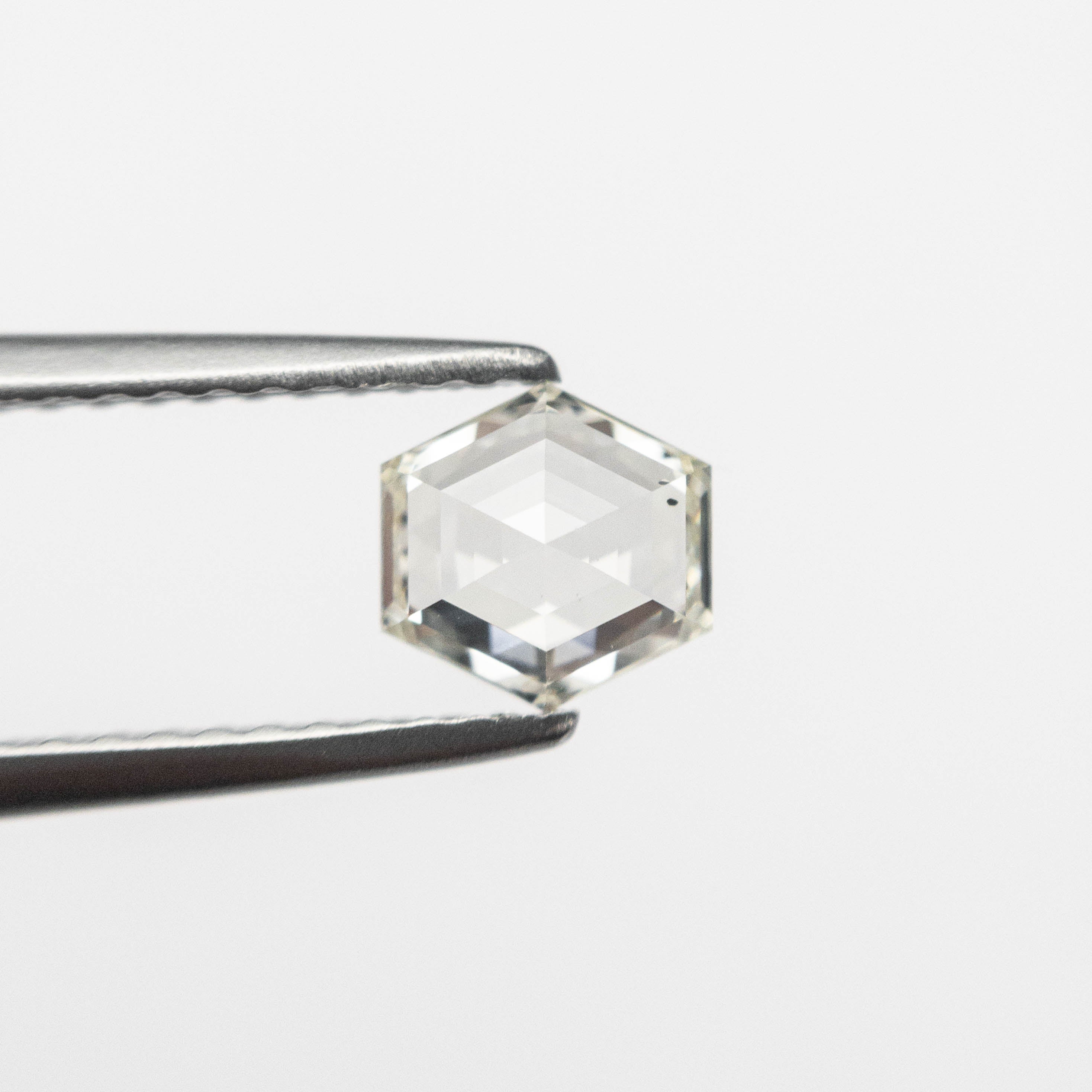 The 0.66ct 5.54x5.51x2.75mm SI1 K Hexagon Step Cut 🇨🇦 19386-09 by East London jeweller Rachel Boston | Discover our collections of unique and timeless engagement rings, wedding rings, and modern fine jewellery.