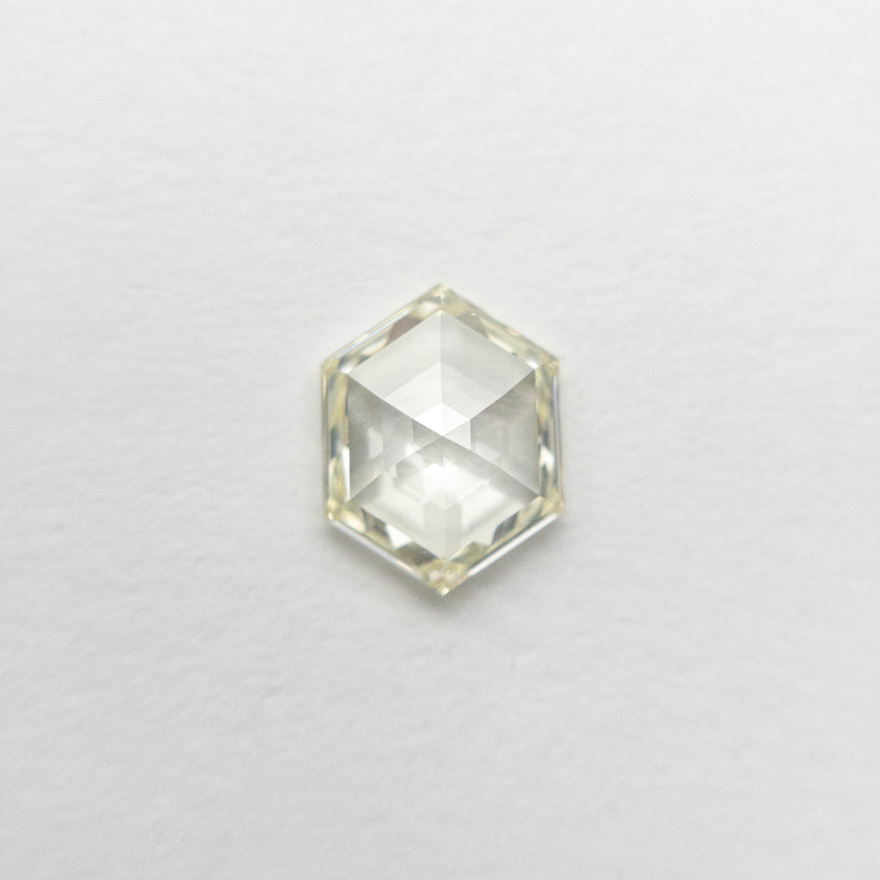 The 0.60ct 6.66x5.13x2.05mm SI1 M/N Hexagon Rosecut 🇨🇦 19386-16 by East London jeweller Rachel Boston | Discover our collections of unique and timeless engagement rings, wedding rings, and modern fine jewellery.