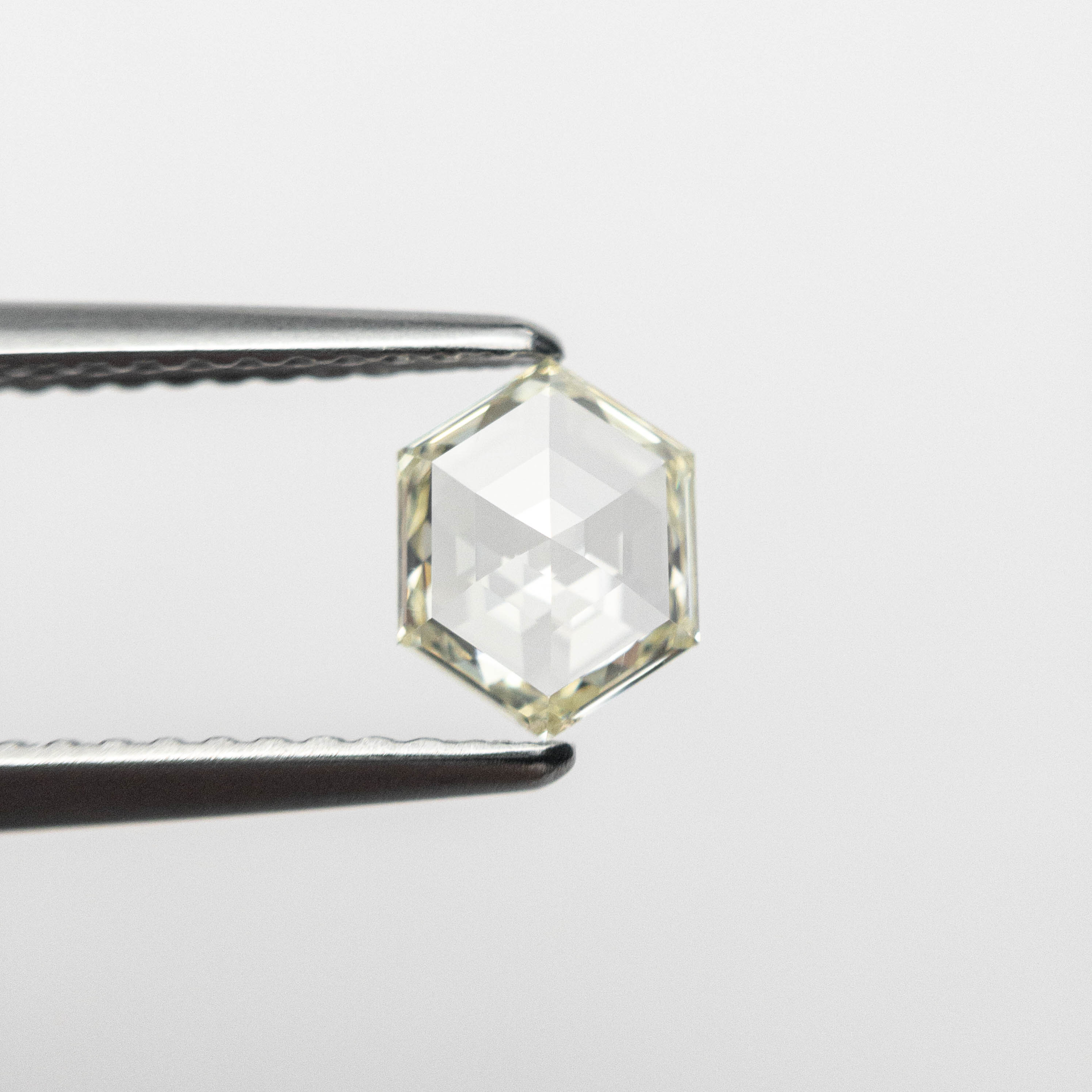 The 0.60ct 6.66x5.13x2.05mm SI1 M/N Hexagon Rosecut 🇨🇦 19386-16 by East London jeweller Rachel Boston | Discover our collections of unique and timeless engagement rings, wedding rings, and modern fine jewellery.