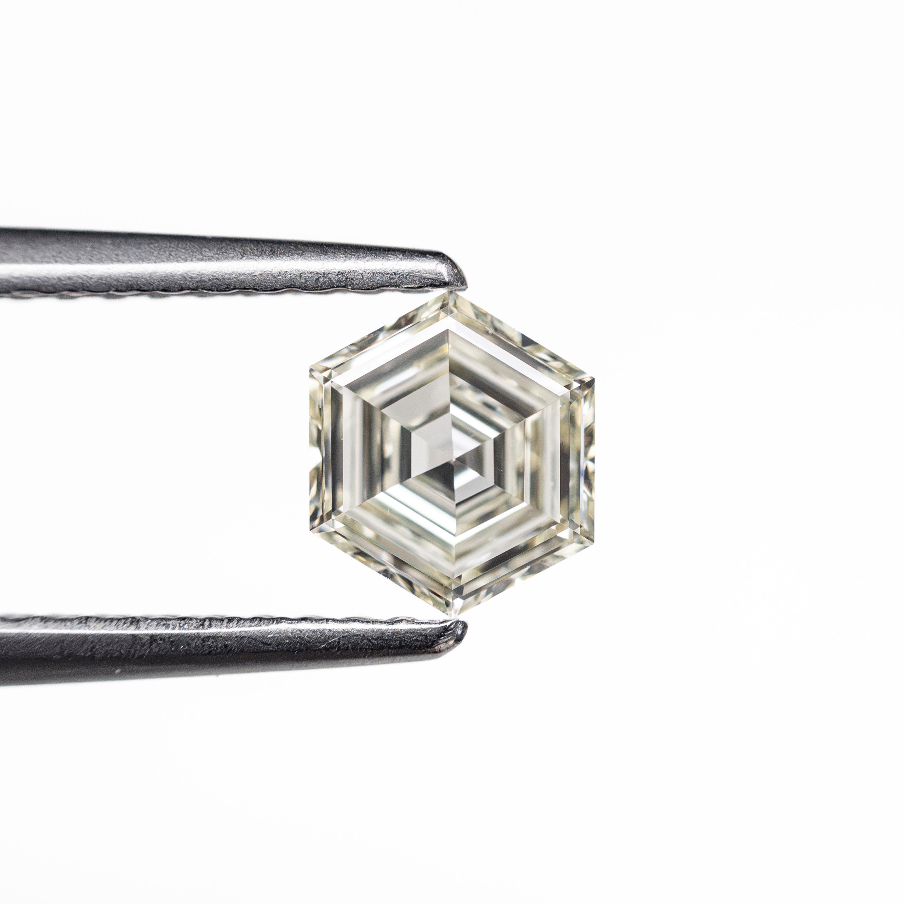 The 0.50ct 5.96x4.96x2.34mm VS1 K Hexagon Step Cut 🇨🇦 19386-27 by East London jeweller Rachel Boston | Discover our collections of unique and timeless engagement rings, wedding rings, and modern fine jewellery.