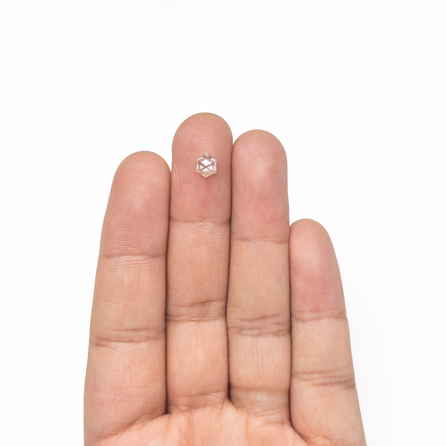 The 0.50ct 5.96x4.96x2.34mm VS1 K Hexagon Step Cut 🇨🇦 19386-27 by East London jeweller Rachel Boston | Discover our collections of unique and timeless engagement rings, wedding rings, and modern fine jewellery.