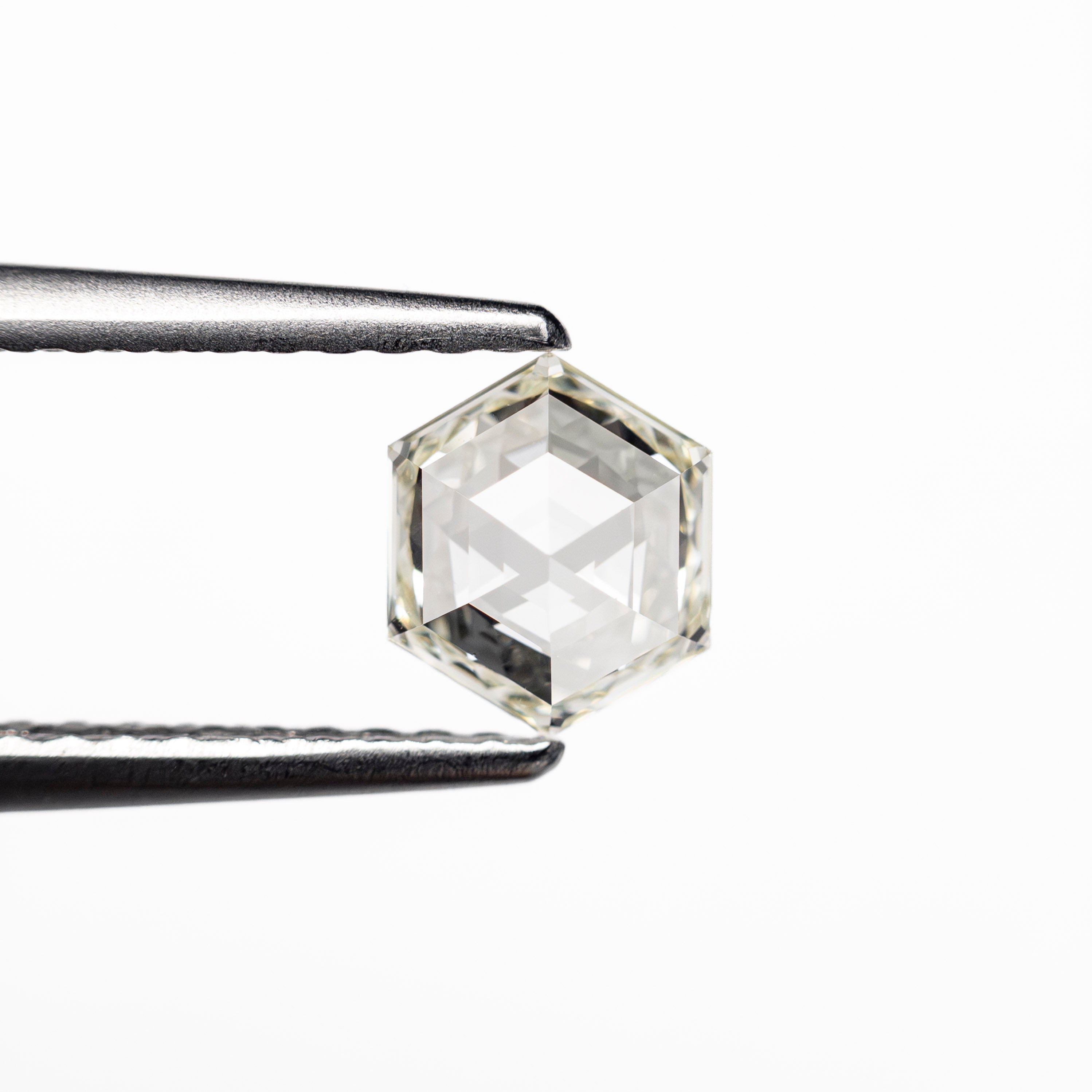 The 0.50ct 5.96x4.96x2.34mm VS1 K Hexagon Step Cut 🇨🇦 19386-27 by East London jeweller Rachel Boston | Discover our collections of unique and timeless engagement rings, wedding rings, and modern fine jewellery.