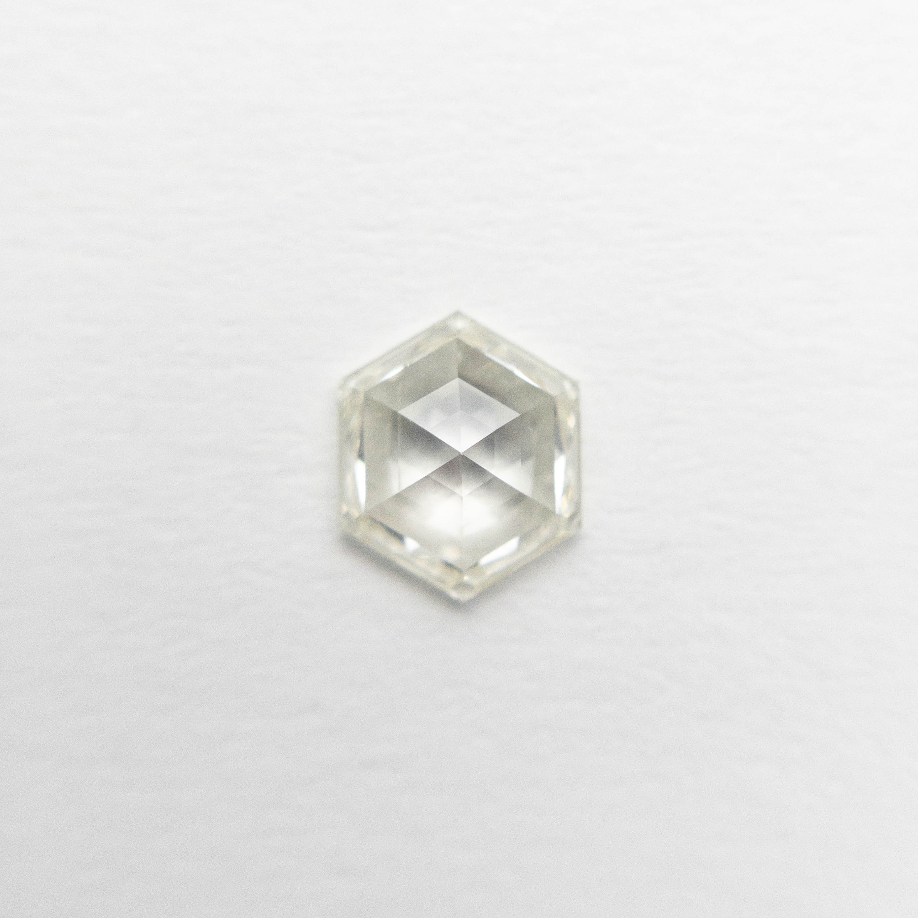 The 0.50ct 5.96x4.96x2.34mm VS1 K Hexagon Rosecut 🇨🇦 19386-27 by East London jeweller Rachel Boston | Discover our collections of unique and timeless engagement rings, wedding rings, and modern fine jewellery.