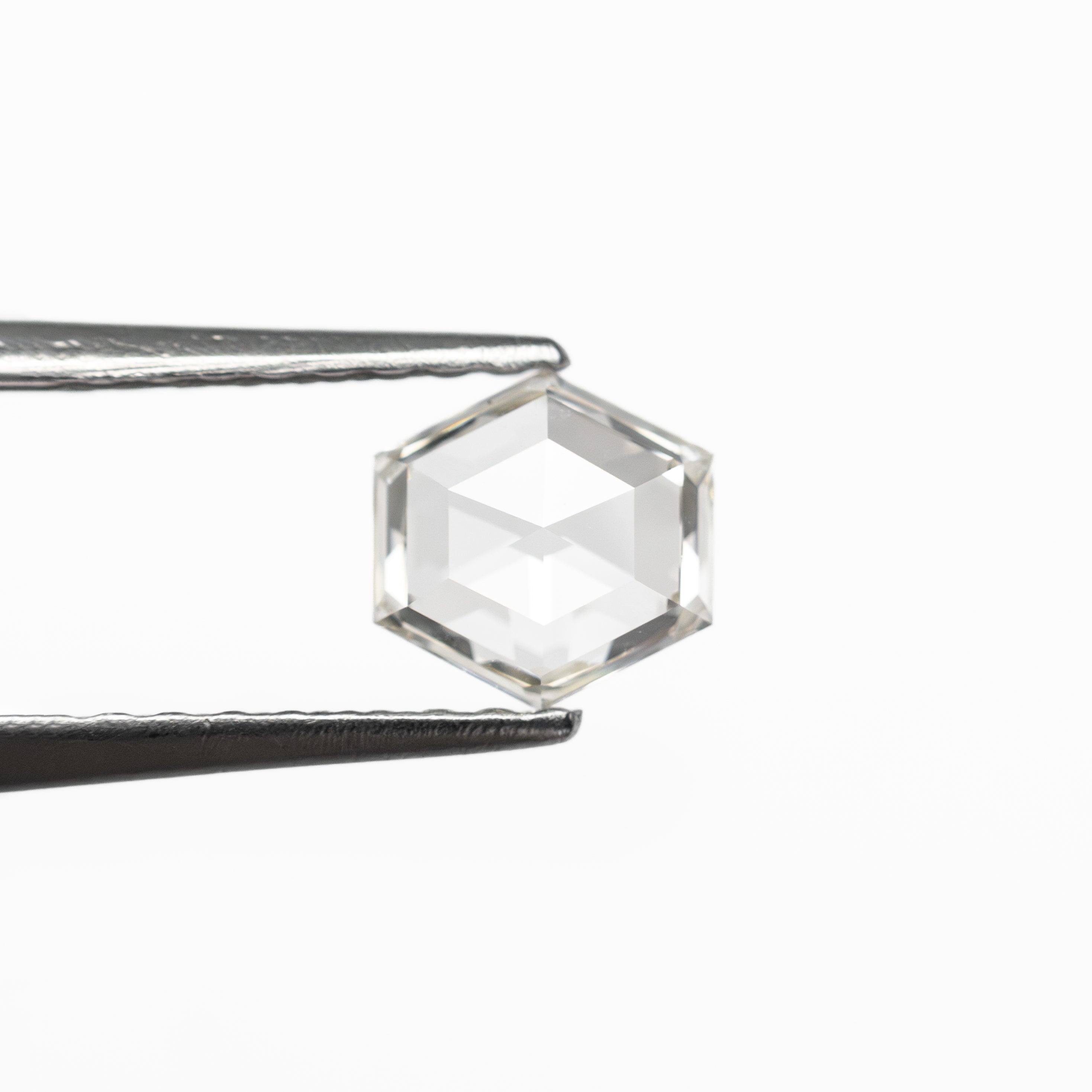 The 0.41ct 5.10x5.07x1.81mm VS2 I Hexagon Rosecut 🇨🇦 19386-32 by East London jeweller Rachel Boston | Discover our collections of unique and timeless engagement rings, wedding rings, and modern fine jewellery.