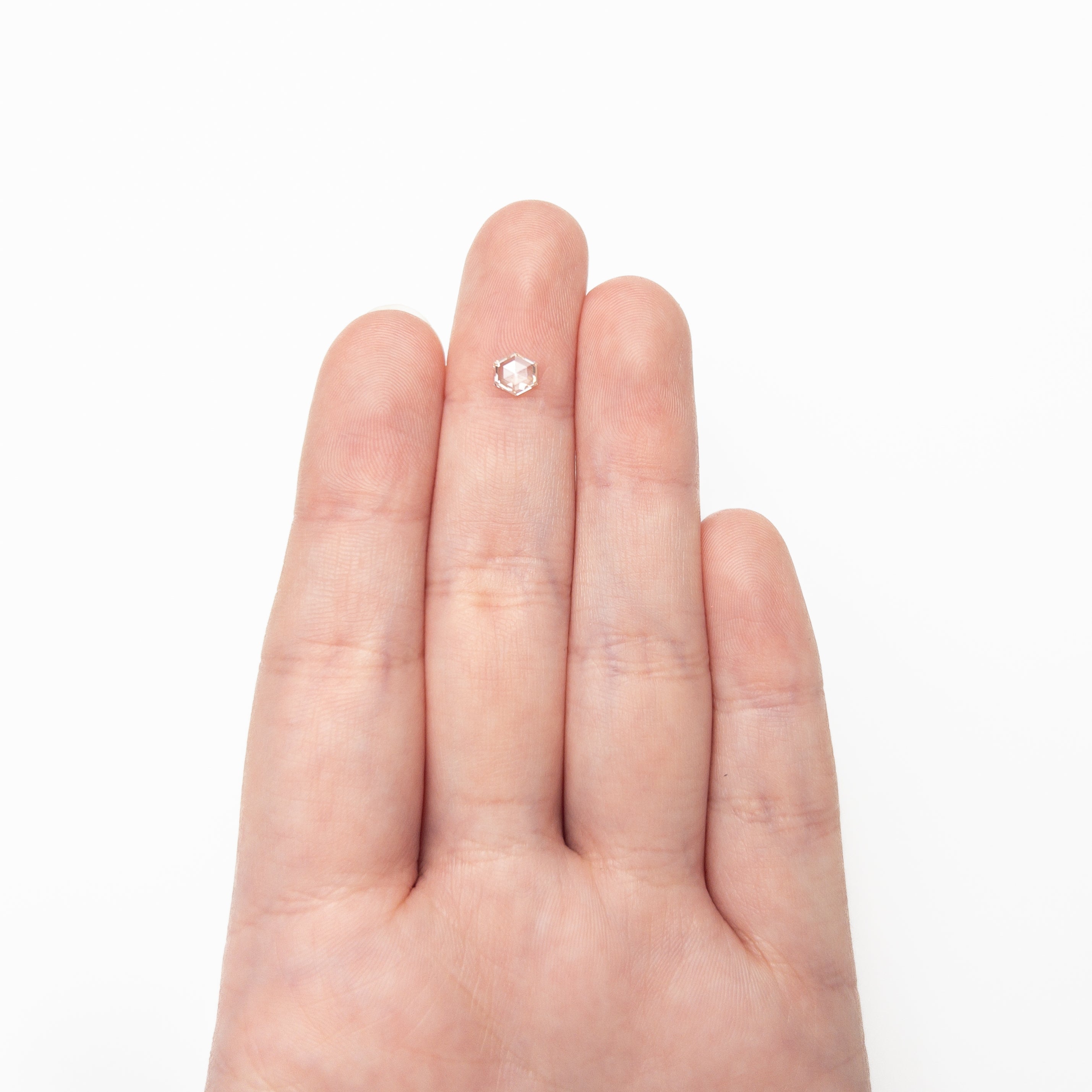 The 0.41ct 5.10x5.07x1.81mm VS2 I Hexagon Rosecut 🇨🇦 19386-32 by East London jeweller Rachel Boston | Discover our collections of unique and timeless engagement rings, wedding rings, and modern fine jewellery.