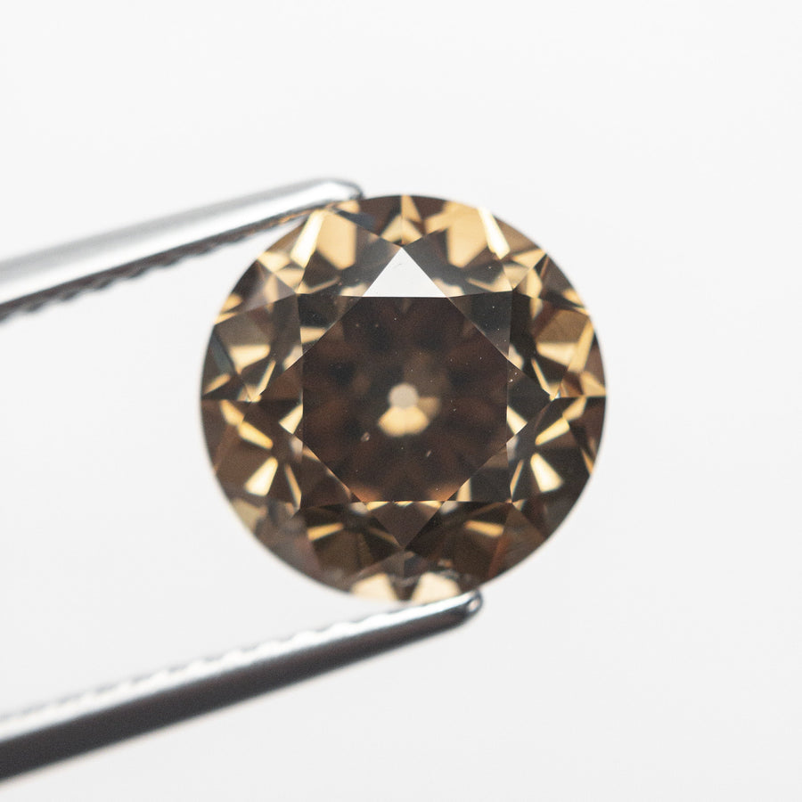 The 4.10ct 9.57x9.54x6.79mm GIA SI1 Fancy Dark Orange-Brown Modern Antique Old European Cut 19400-01 by East London jeweller Rachel Boston | Discover our collections of unique and timeless engagement rings, wedding rings, and modern fine jewellery. - Rachel Boston Jewellery