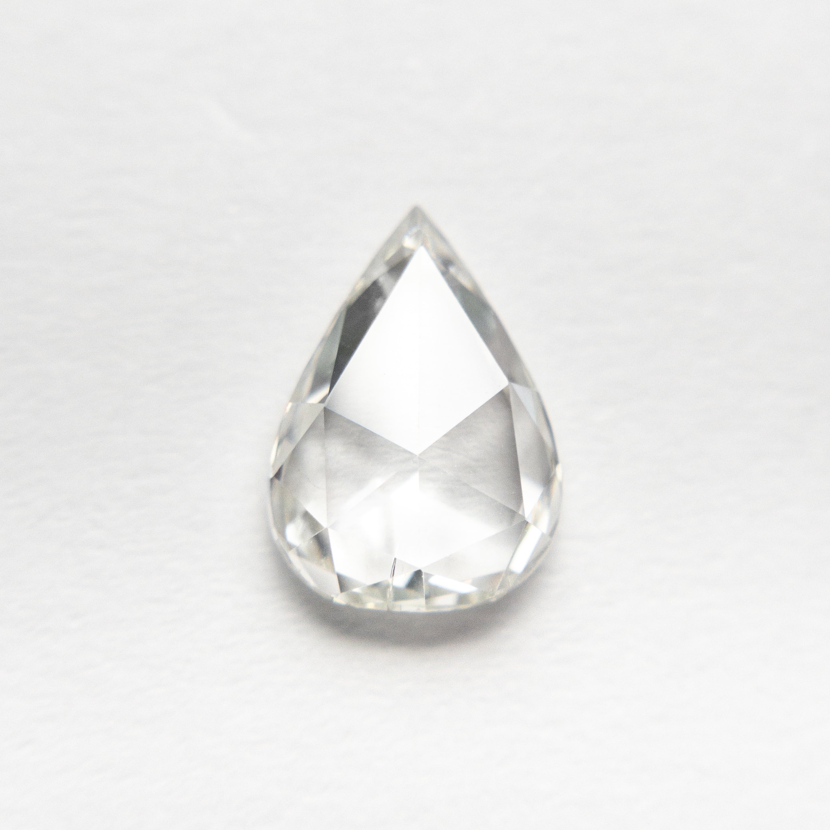 The 1.25ct 8.94x6.42x2.66mm SI2 I Pear Rosecut 19405-06 by East London jeweller Rachel Boston | Discover our collections of unique and timeless engagement rings, wedding rings, and modern fine jewellery.