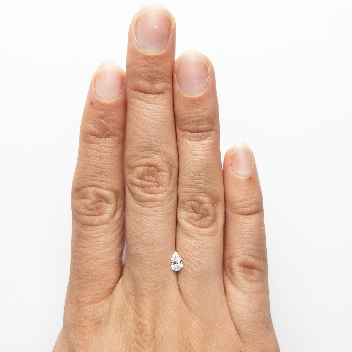 The 0.30ct 5.58x3.66x2.33mm SI2 E Pear Brilliant 19438-24 by East London jeweller Rachel Boston | Discover our collections of unique and timeless engagement rings, wedding rings, and modern fine jewellery.