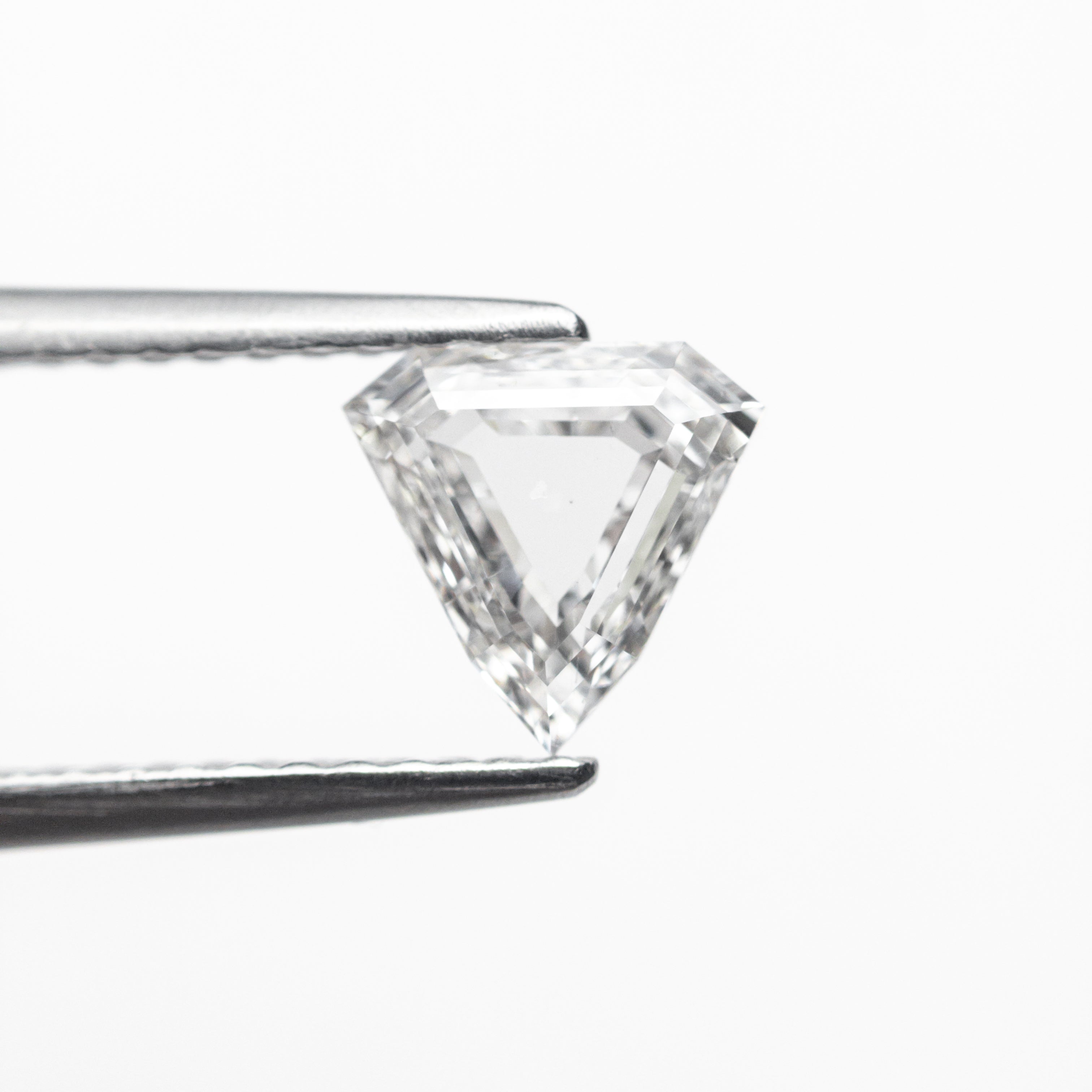 The 0.64ct 6.19x6.42x2.23mm SI2 F Shield Portrait Cut 19438-28 by East London jeweller Rachel Boston | Discover our collections of unique and timeless engagement rings, wedding rings, and modern fine jewellery.