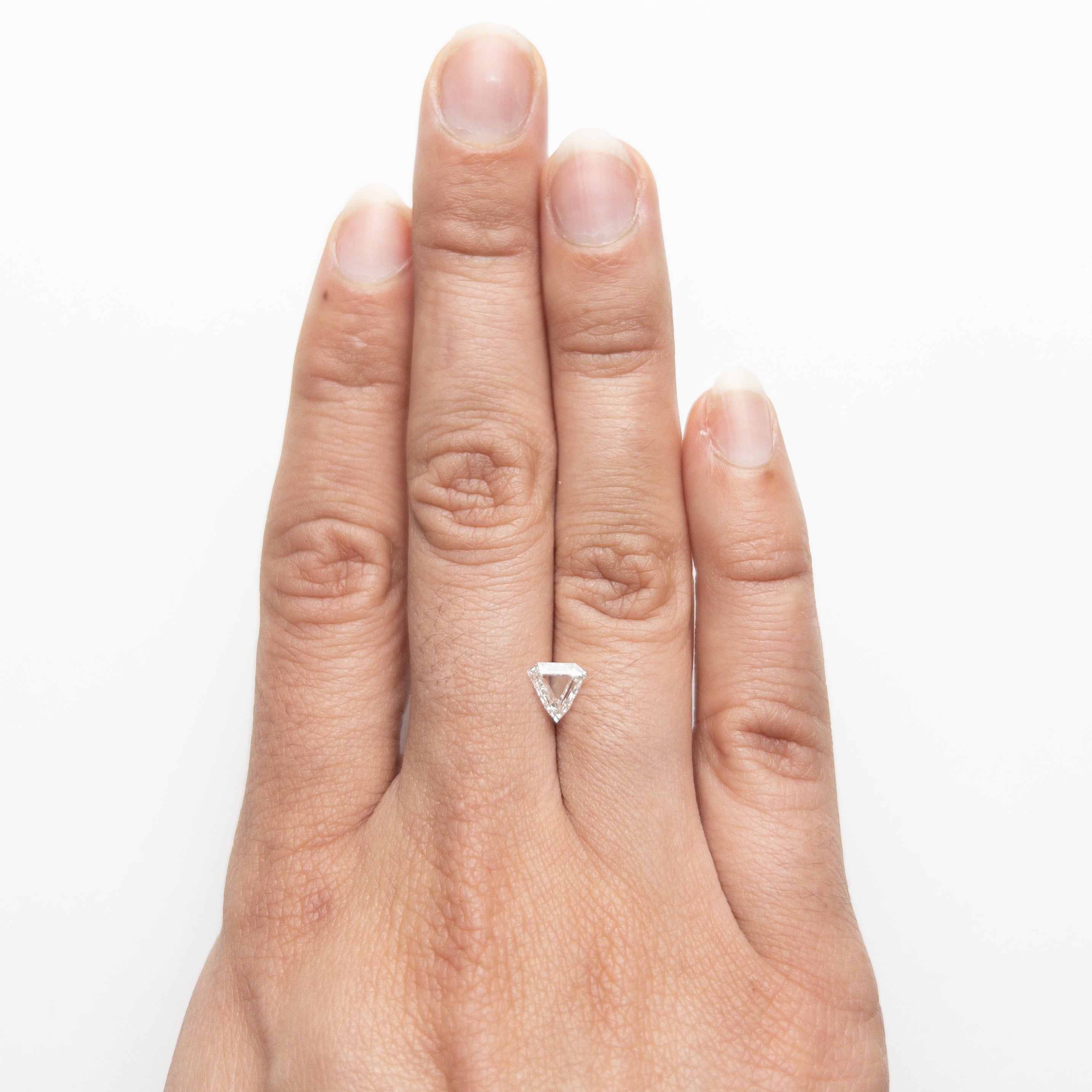 The 0.64ct 6.19x6.42x2.23mm SI2 F Shield Portrait Cut 19438-28 by East London jeweller Rachel Boston | Discover our collections of unique and timeless engagement rings, wedding rings, and modern fine jewellery.