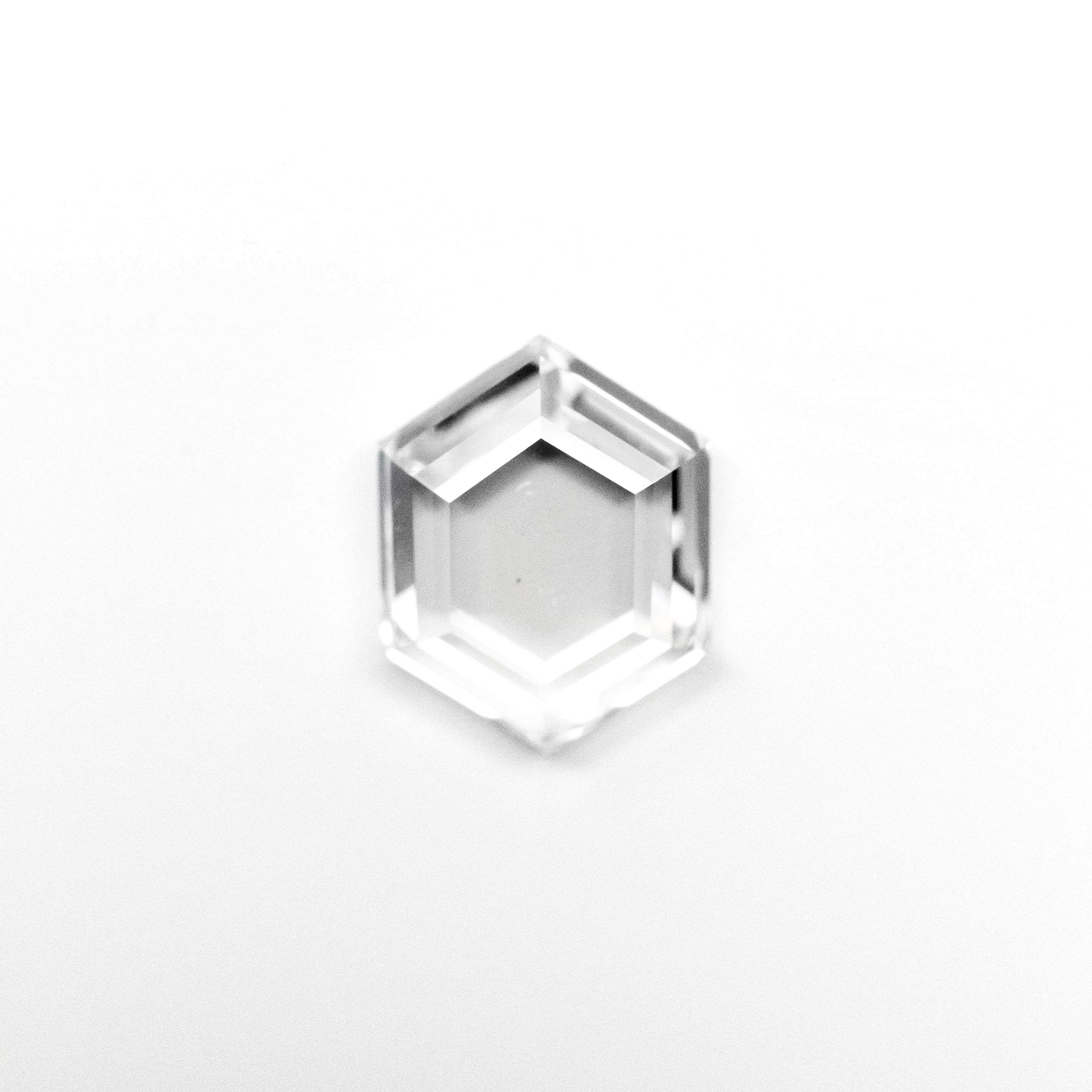 The 0.51ct 6.22x4.80x1.67mm SI1 F Hexagon Portrait Cut 19438-32 by East London jeweller Rachel Boston | Discover our collections of unique and timeless engagement rings, wedding rings, and modern fine jewellery.