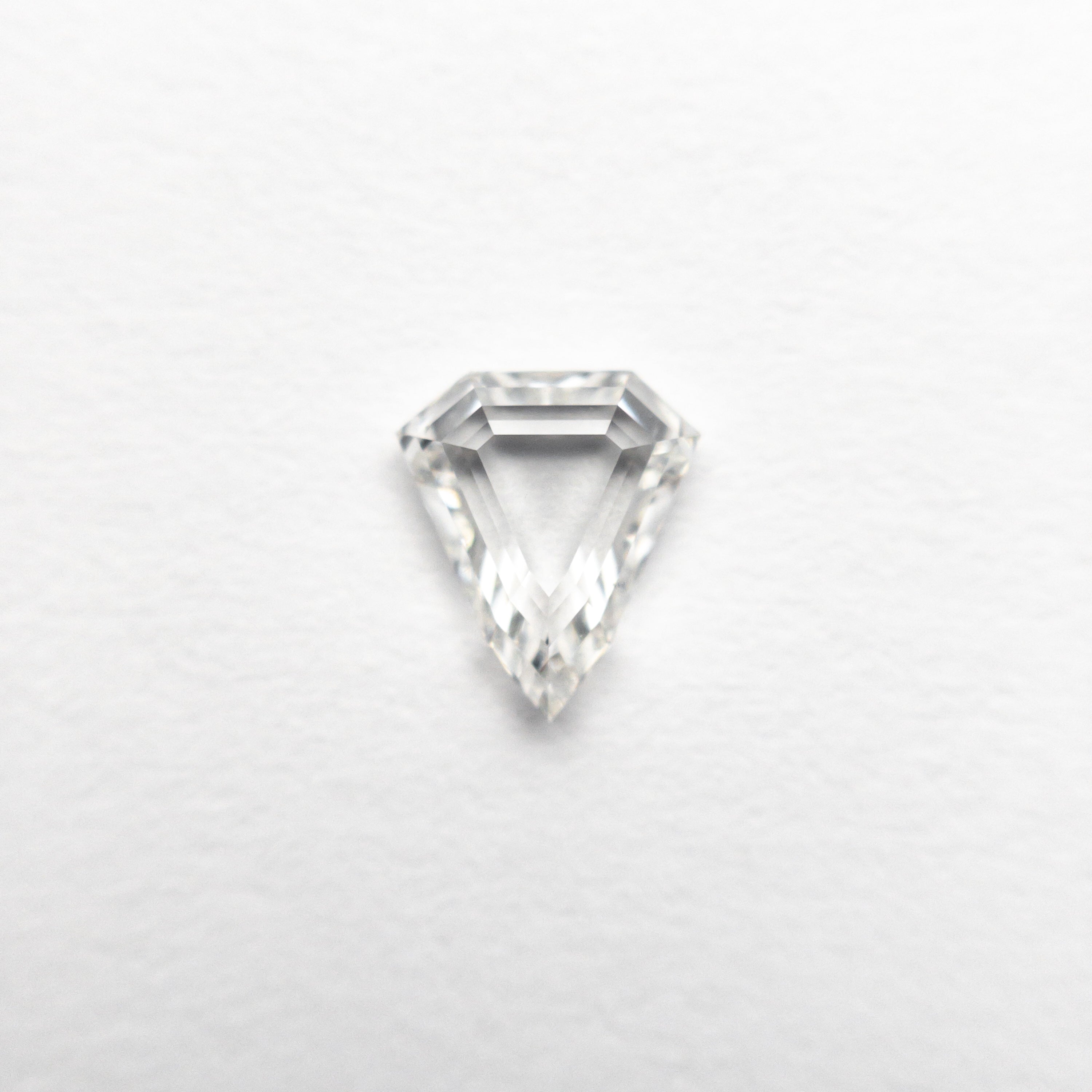 The 0.51ct 6.04x5.24x2.07mm SI1 G Shield Portrait Cut 19438-34 by East London jeweller Rachel Boston | Discover our collections of unique and timeless engagement rings, wedding rings, and modern fine jewellery.
