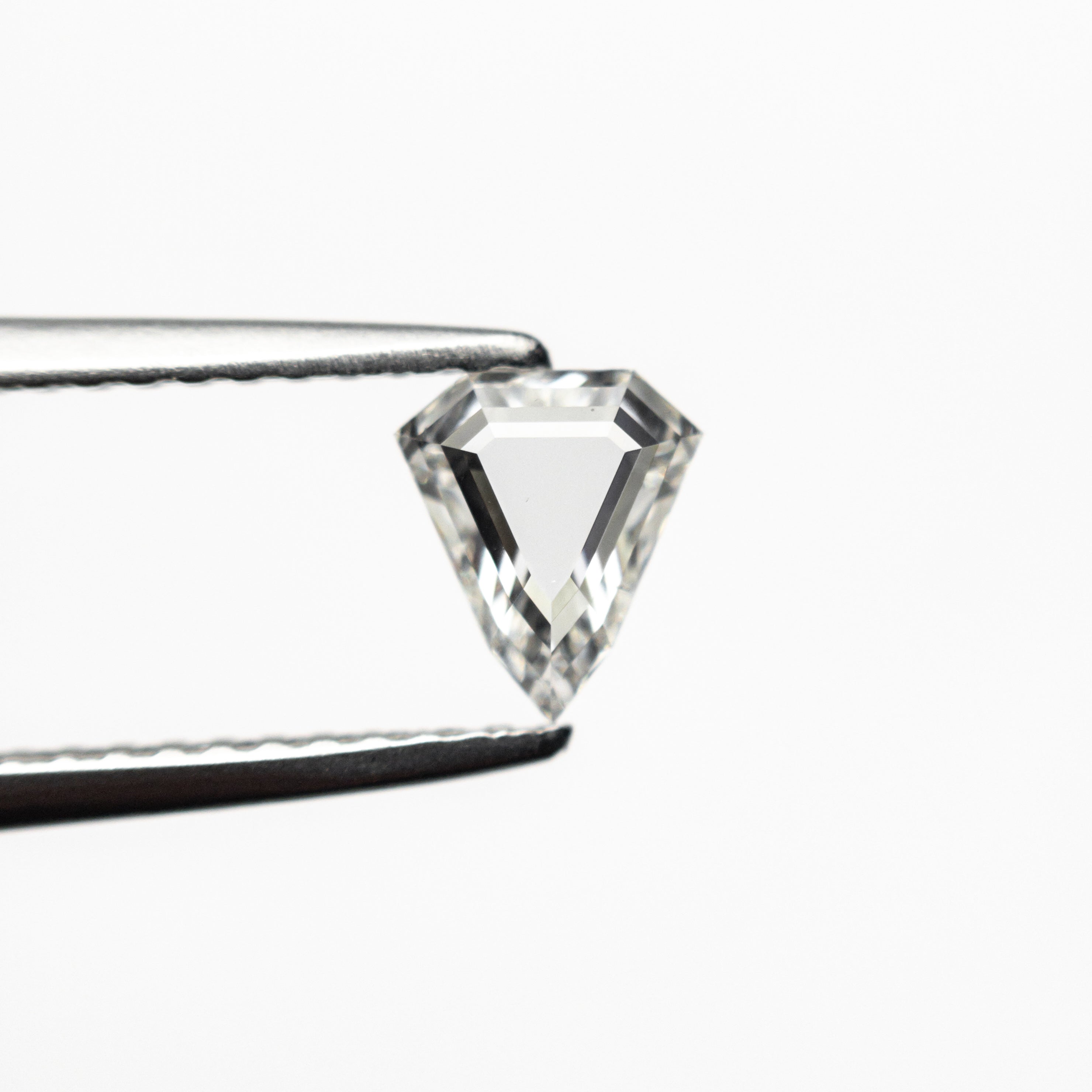The 0.51ct 6.04x5.24x2.07mm SI1 G Shield Portrait Cut 19438-34 by East London jeweller Rachel Boston | Discover our collections of unique and timeless engagement rings, wedding rings, and modern fine jewellery.