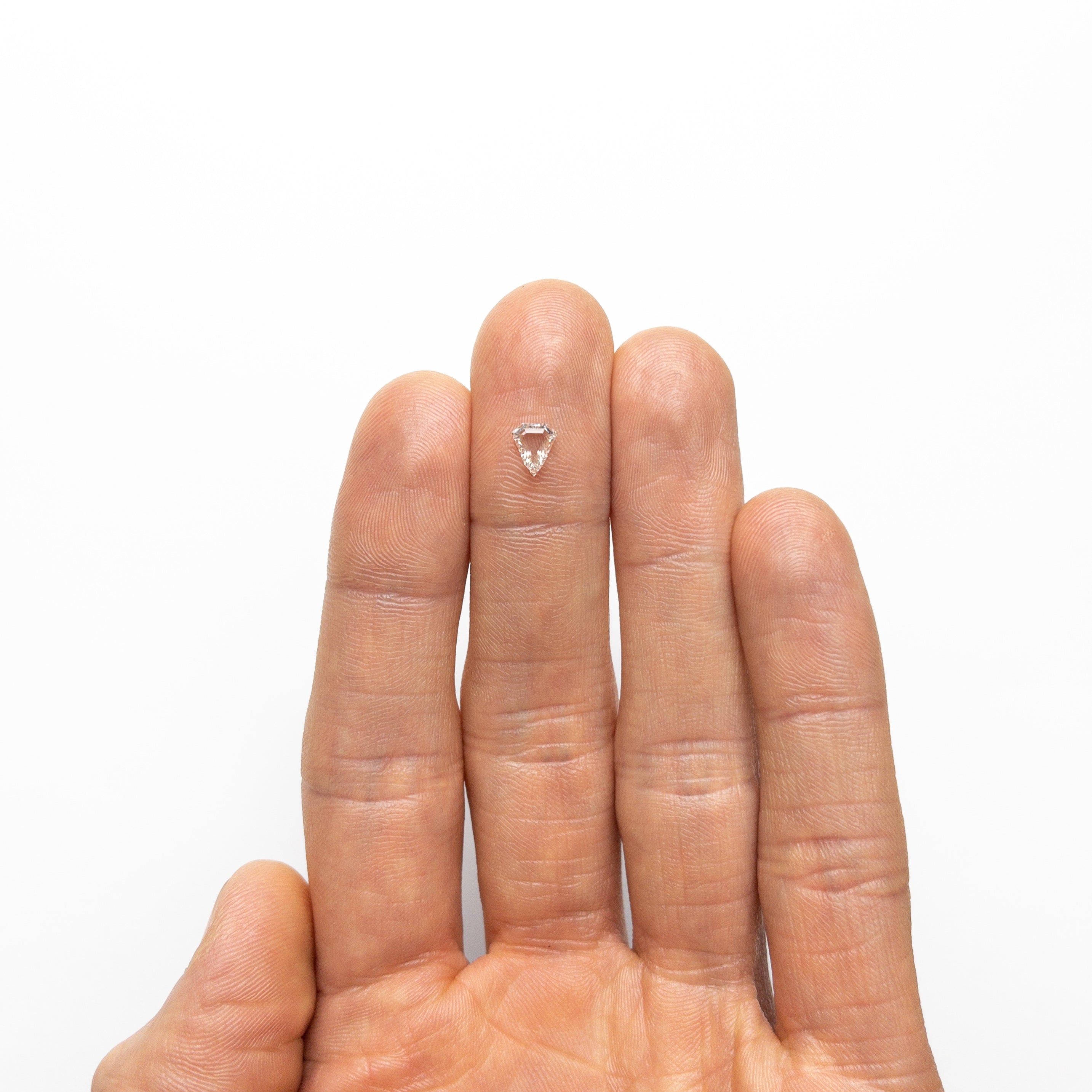 The 0.51ct 6.04x5.24x2.07mm SI1 G Shield Portrait Cut 19438-34 by East London jeweller Rachel Boston | Discover our collections of unique and timeless engagement rings, wedding rings, and modern fine jewellery.