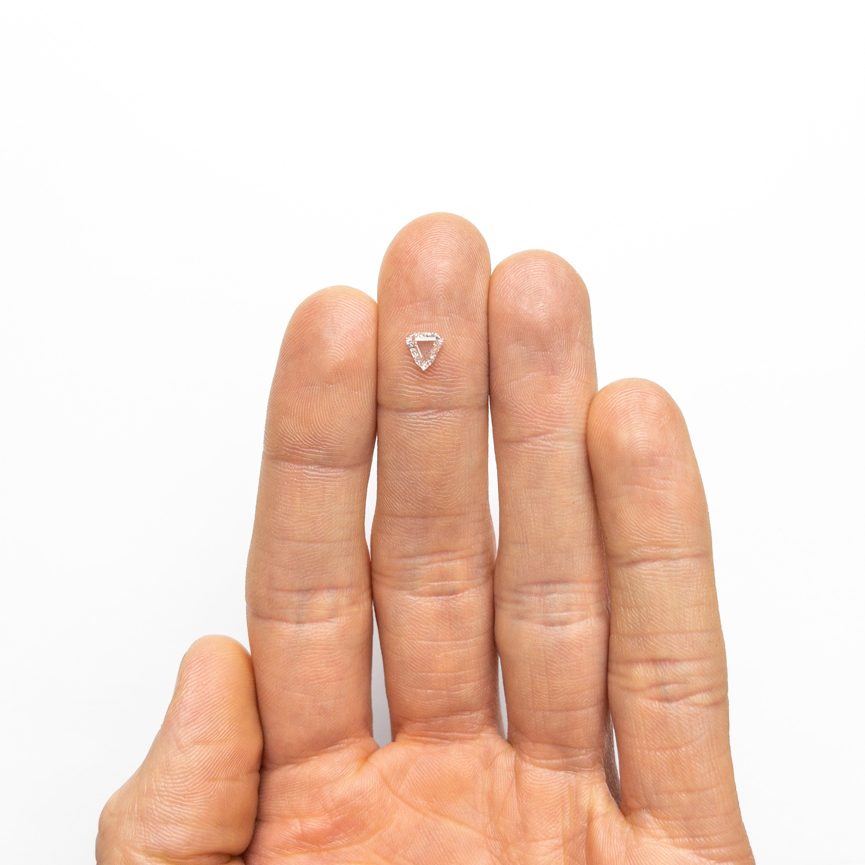 The 0.50ct 5.46x5.67x2.08mm SI2 G Shield Portrait Cut 19438-36 by East London jeweller Rachel Boston | Discover our collections of unique and timeless engagement rings, wedding rings, and modern fine jewellery.
