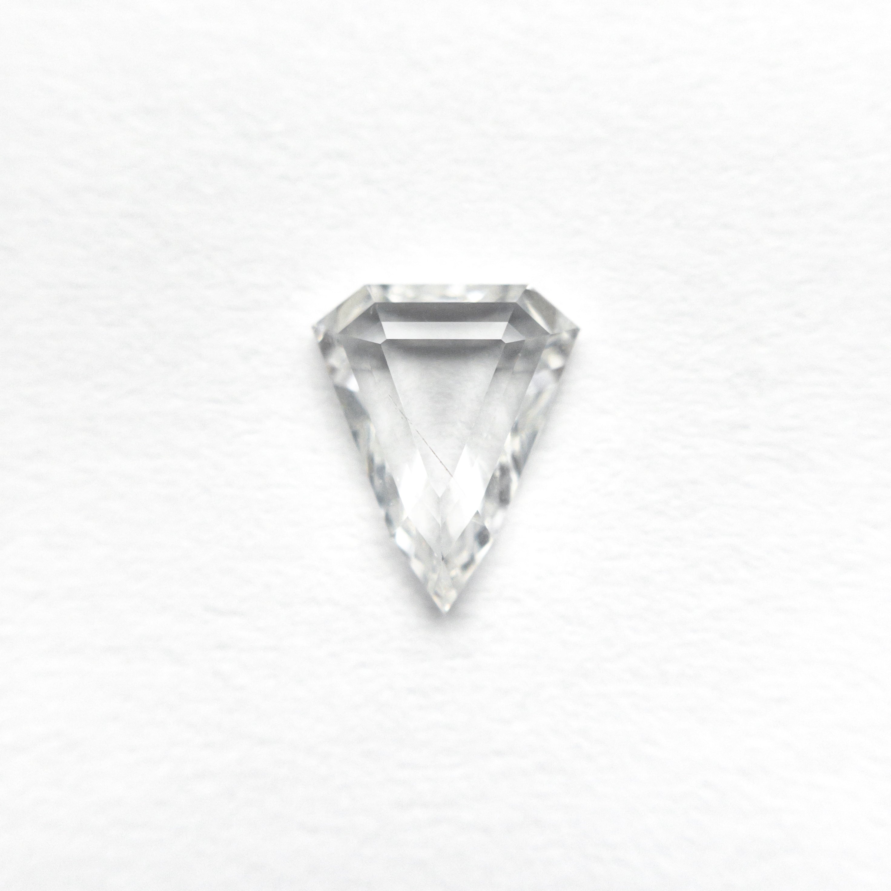 The 0.59ct 6.90x5.63x1.96mm SI2 F Shield Portrait Cut 19438-38 by East London jeweller Rachel Boston | Discover our collections of unique and timeless engagement rings, wedding rings, and modern fine jewellery.