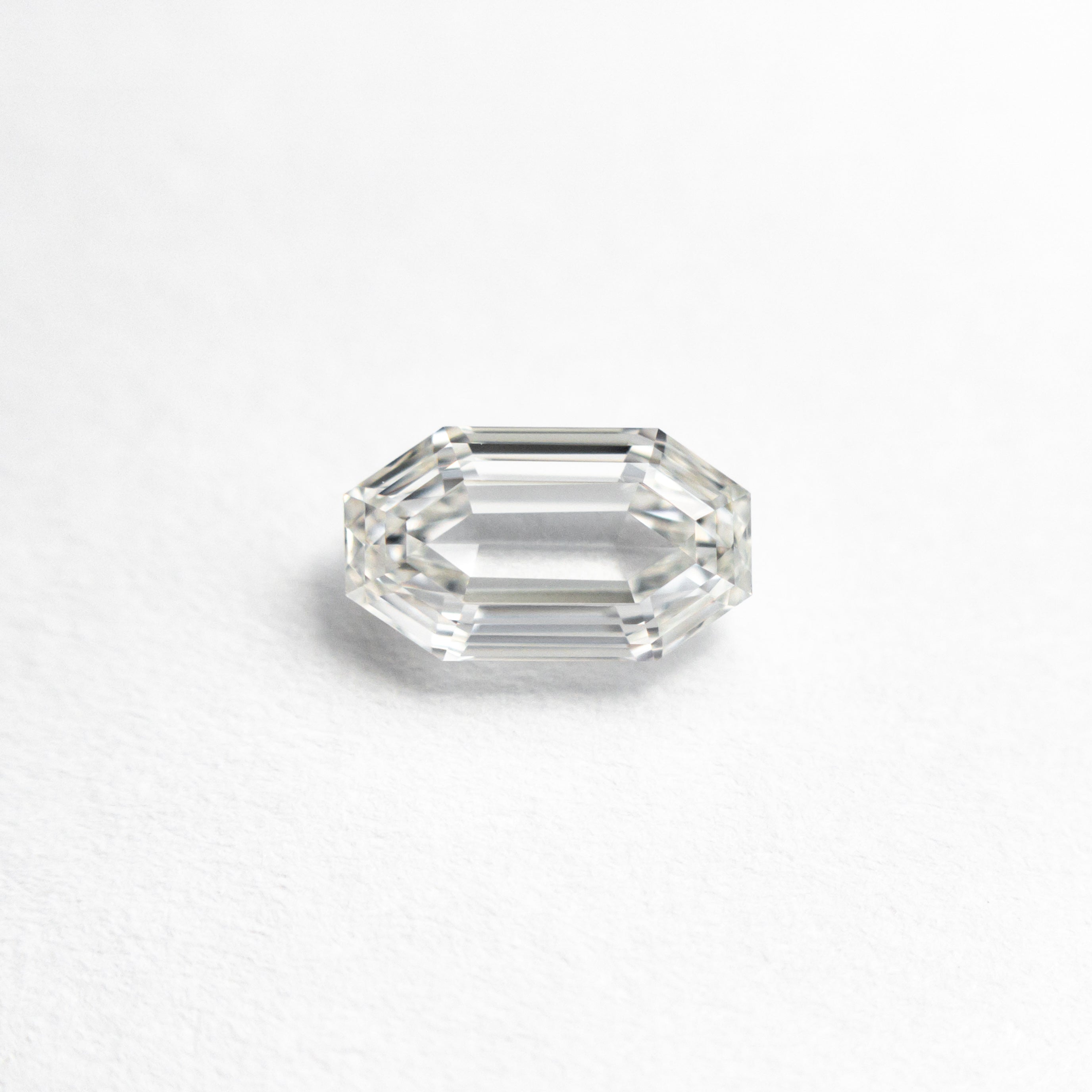 The 0.60ct 6.34x3.64x2.56mm SI1 H Cut Corner Rectangle Step Cut 19438-41 by East London jeweller Rachel Boston | Discover our collections of unique and timeless engagement rings, wedding rings, and modern fine jewellery.