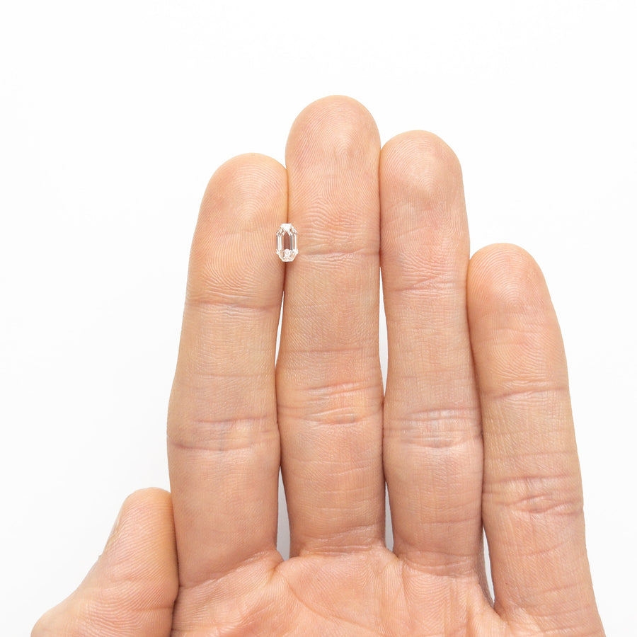 The 0.60ct 6.34x3.64x2.56mm SI1 H Cut Corner Rectangle Step Cut 19438-41 by East London jeweller Rachel Boston | Discover our collections of unique and timeless engagement rings, wedding rings, and modern fine jewellery. - Rachel Boston Jewellery