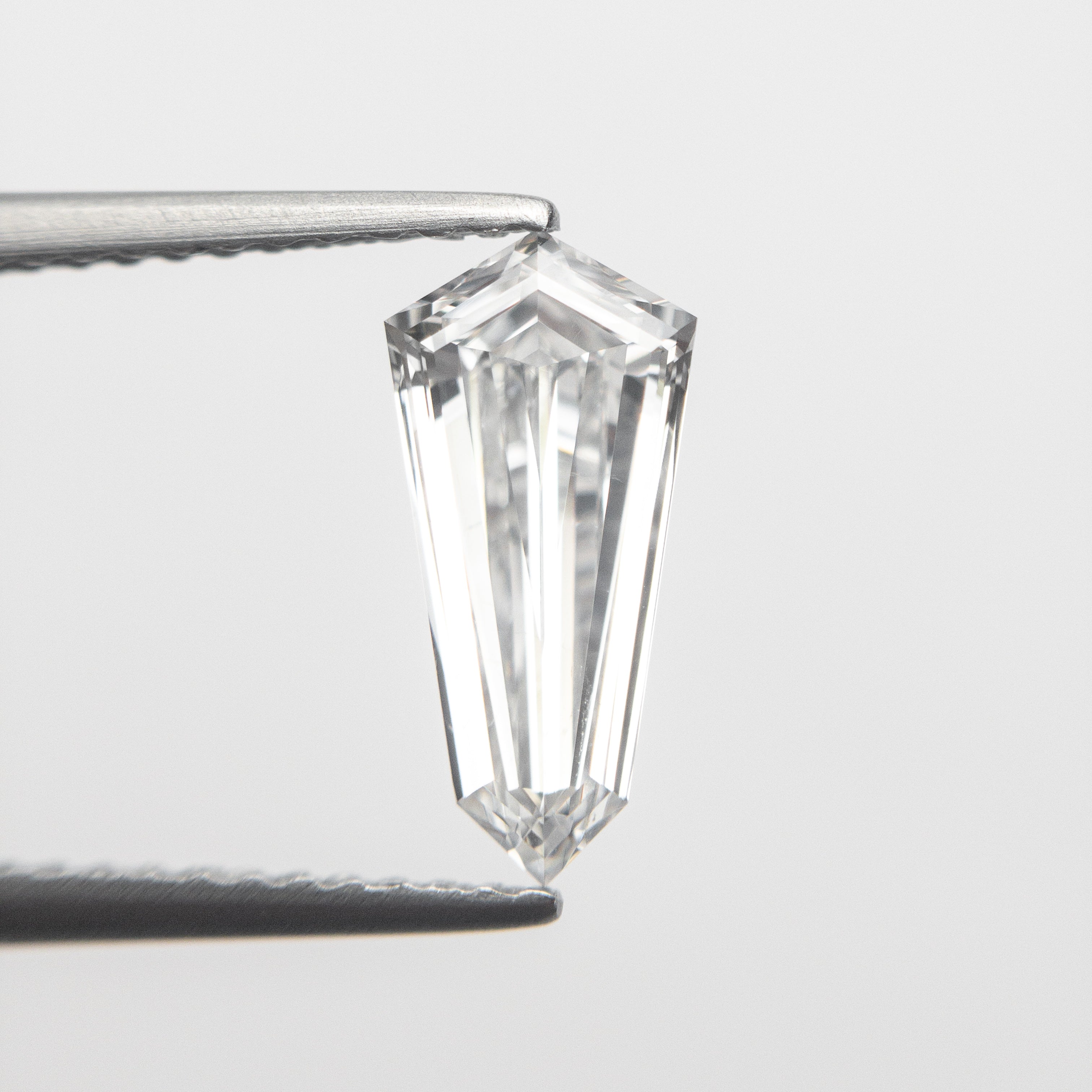 The 1.10ct 10.99x5.26x2.90mm GIA SI1 E Kite Step Cut 19488-01 by East London jeweller Rachel Boston | Discover our collections of unique and timeless engagement rings, wedding rings, and modern fine jewellery.