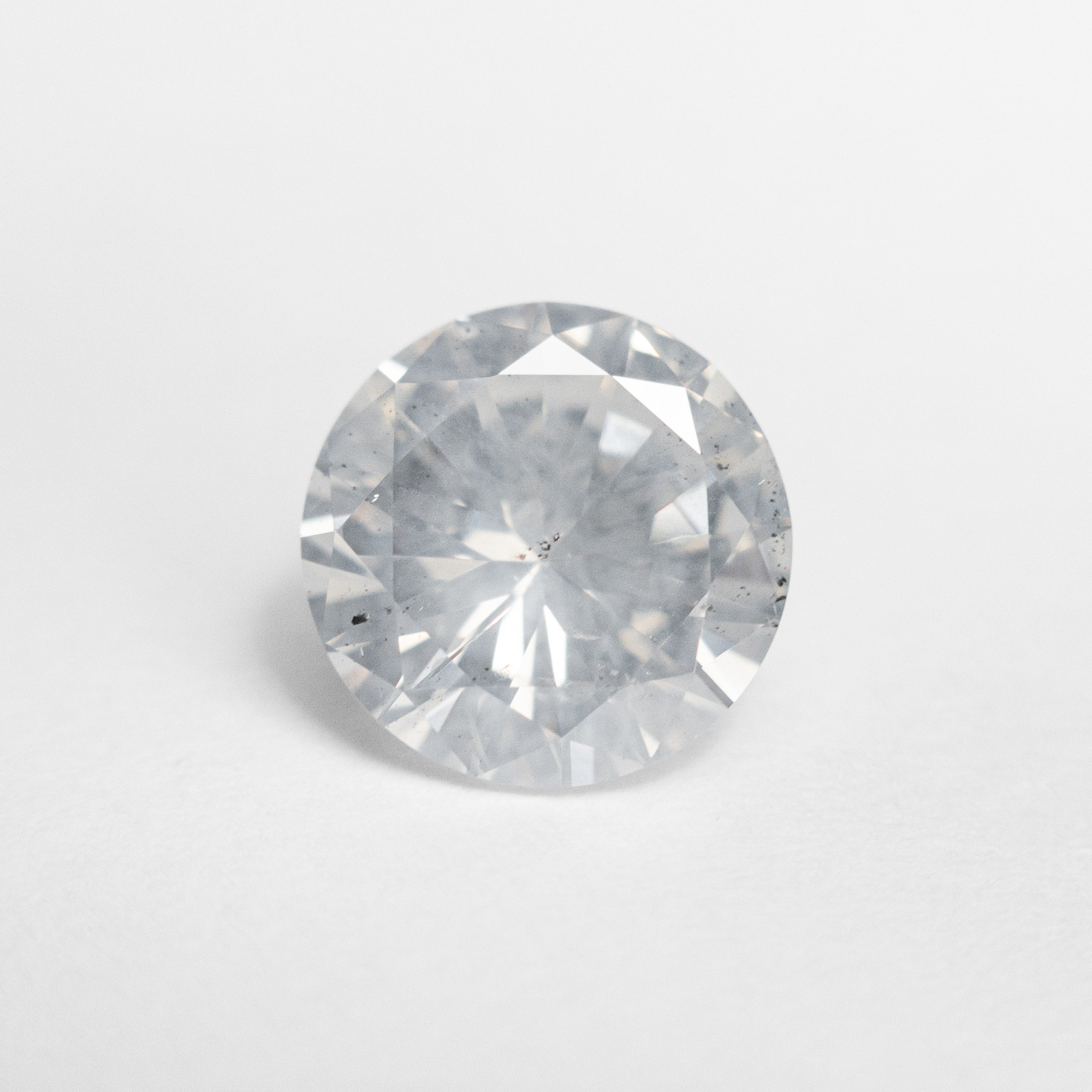 The 2.01ct 8.19x8.18x4.72mm Fancy White Round Brilliant 19540-01 by East London jeweller Rachel Boston | Discover our collections of unique and timeless engagement rings, wedding rings, and modern fine jewellery.