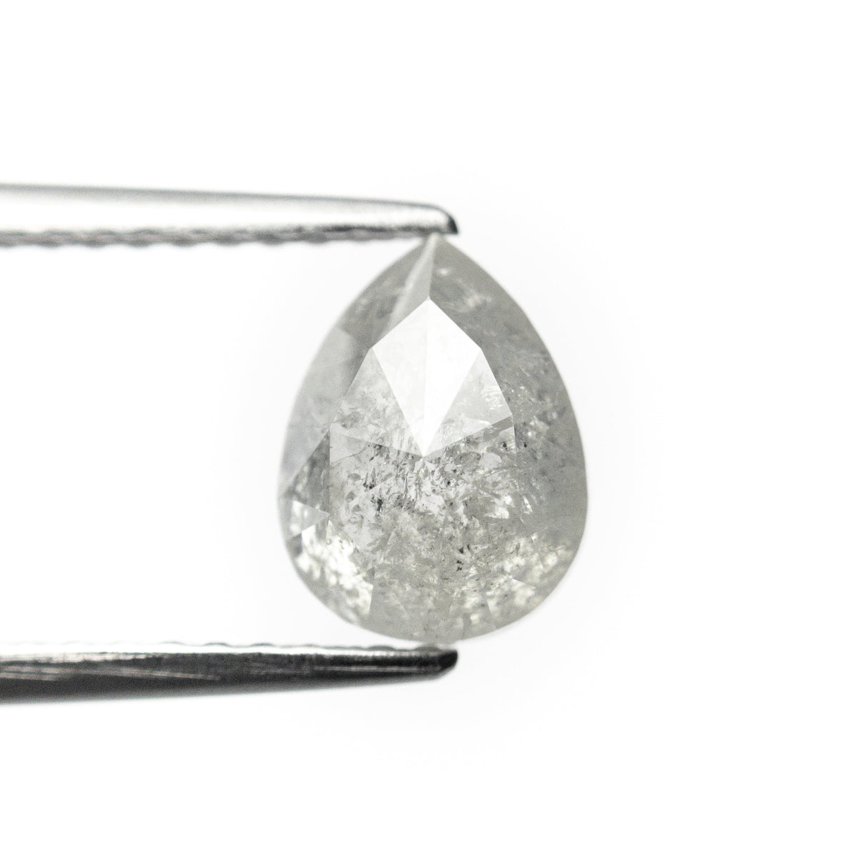 The 1.29ct 7.70x5.80x3.40mm Pear Rosecut 19609-13 by East London jeweller Rachel Boston | Discover our collections of unique and timeless engagement rings, wedding rings, and modern fine jewellery.