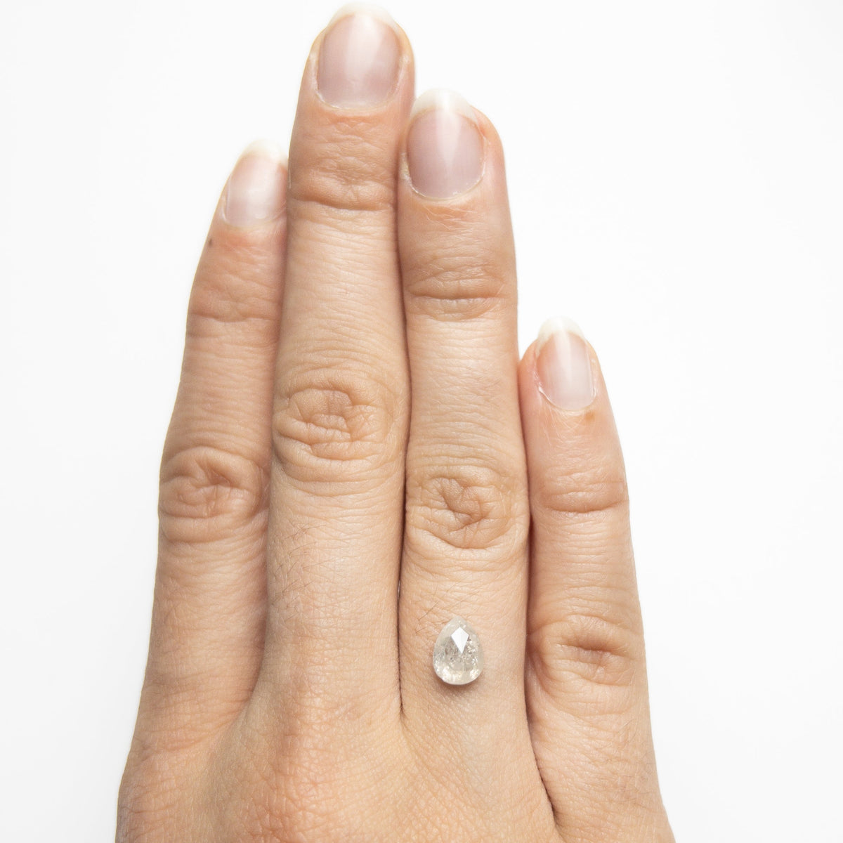 The 1.29ct 7.70x5.80x3.40mm Pear Rosecut 19609-13 by East London jeweller Rachel Boston | Discover our collections of unique and timeless engagement rings, wedding rings, and modern fine jewellery.