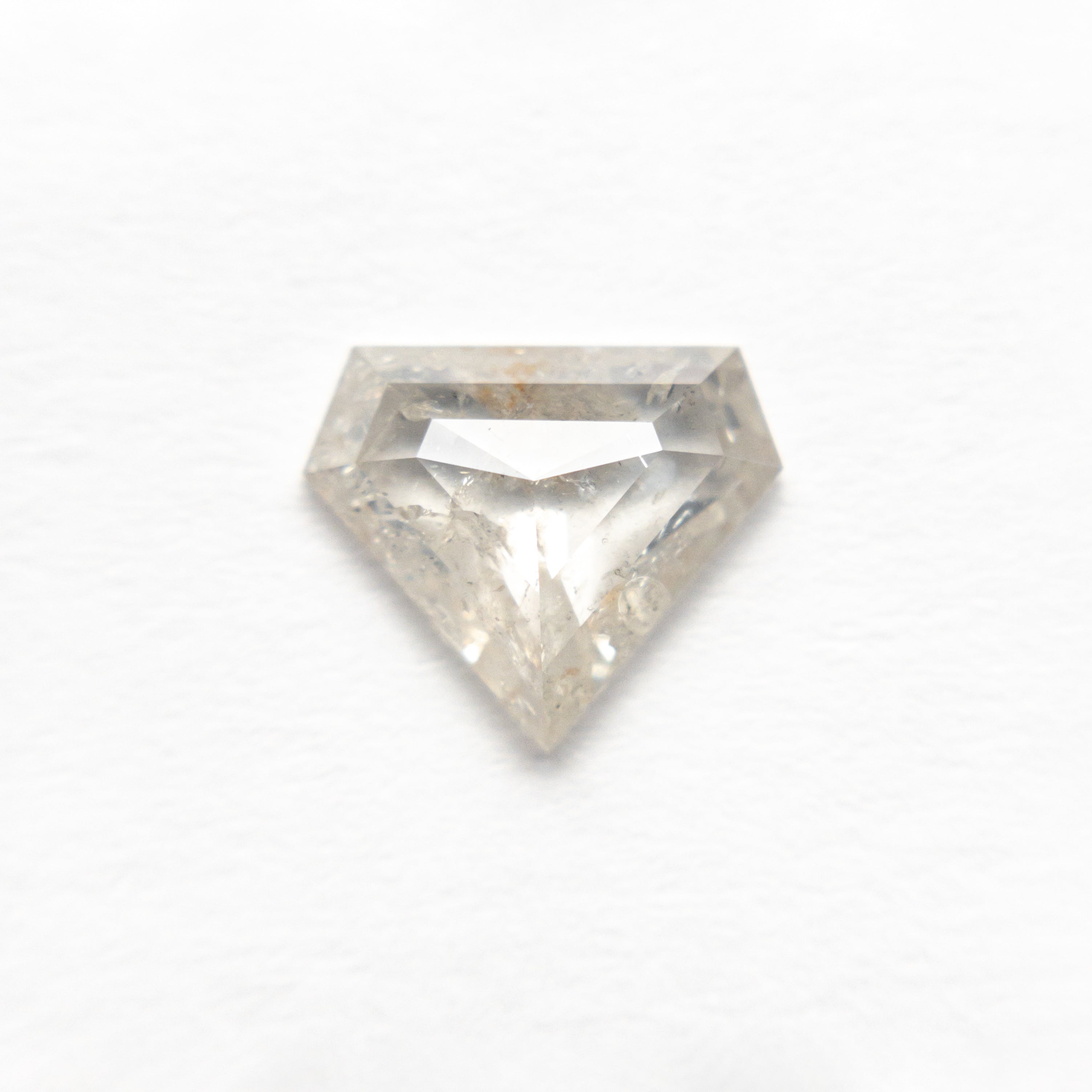 The 0.97ct 7.01x8.27x2.36mm Shield Rosecut 19617-06 by East London jeweller Rachel Boston | Discover our collections of unique and timeless engagement rings, wedding rings, and modern fine jewellery.