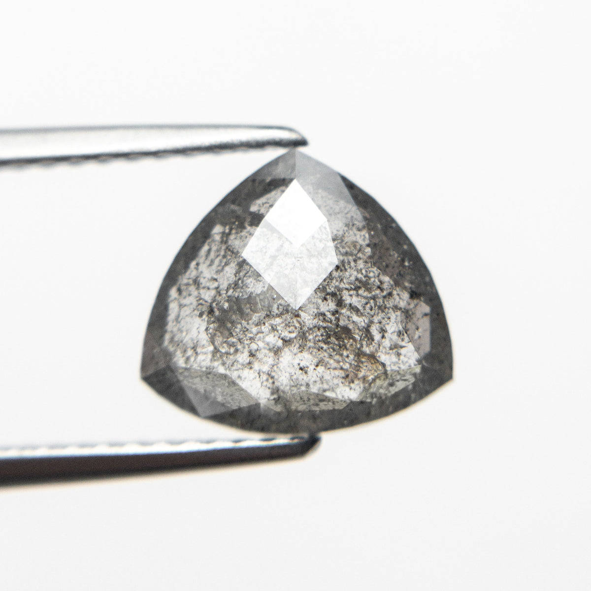 The 1.83ct 9.11x8.32x3.14mm Trillion Double Cut 19622-31 by East London jeweller Rachel Boston | Discover our collections of unique and timeless engagement rings, wedding rings, and modern fine jewellery.
