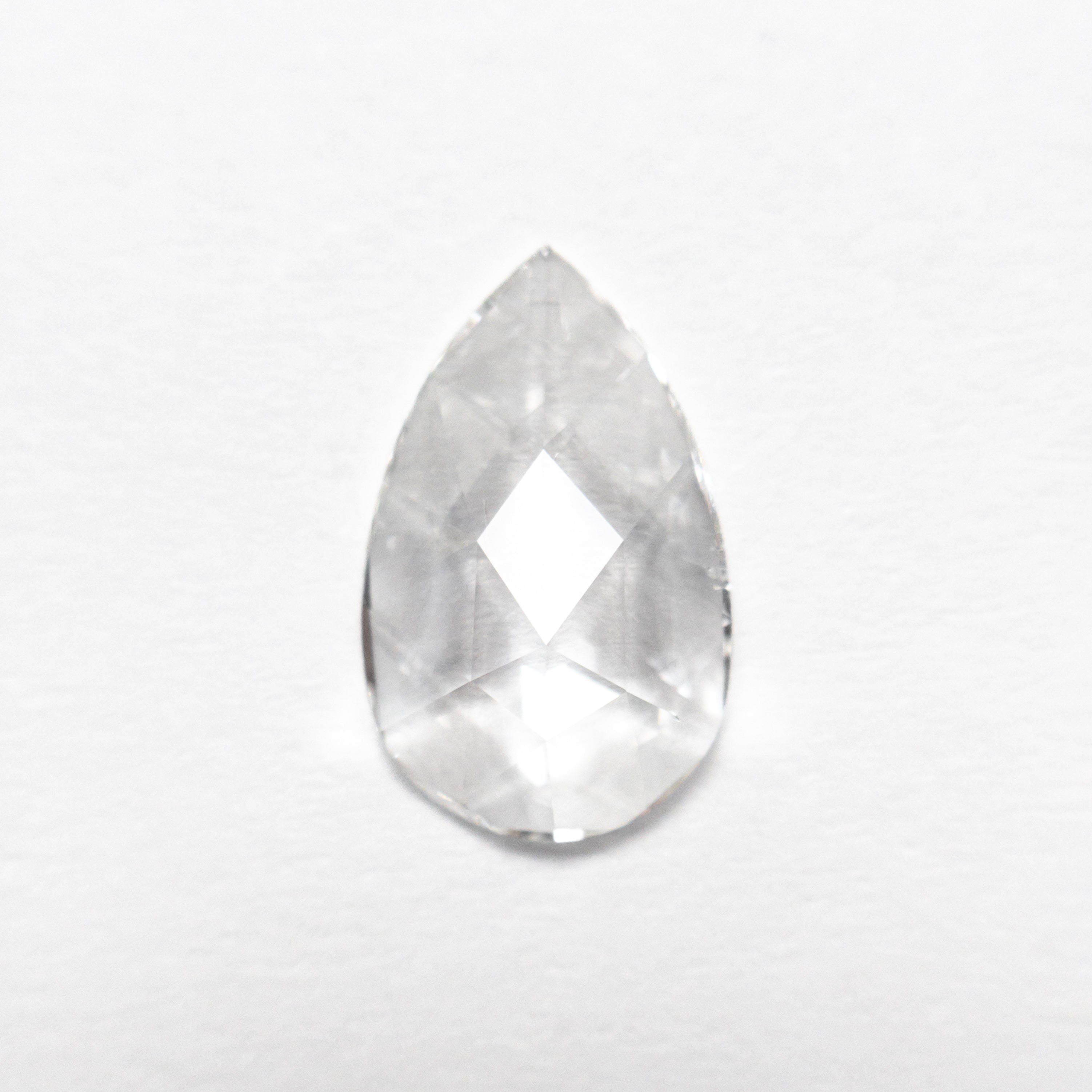 The 1.00ct 10.33x6.44x1.98mm SI2 E Pear Rosecut 19645-01 by East London jeweller Rachel Boston | Discover our collections of unique and timeless engagement rings, wedding rings, and modern fine jewellery.
