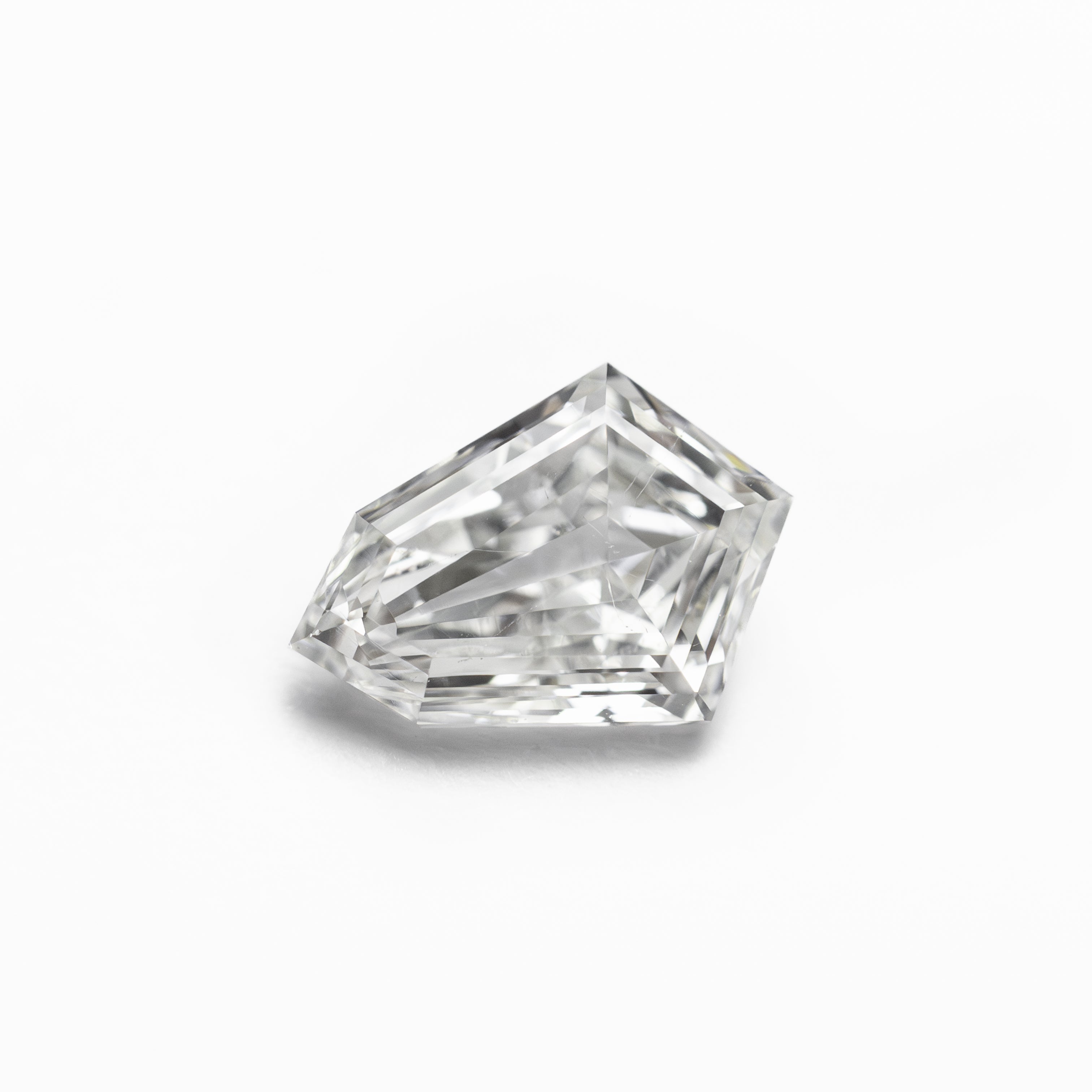 The 0.81ct 7.96x5.64x2.69mm SI1 F Kite Step Cut 19649-01 by East London jeweller Rachel Boston | Discover our collections of unique and timeless engagement rings, wedding rings, and modern fine jewellery.