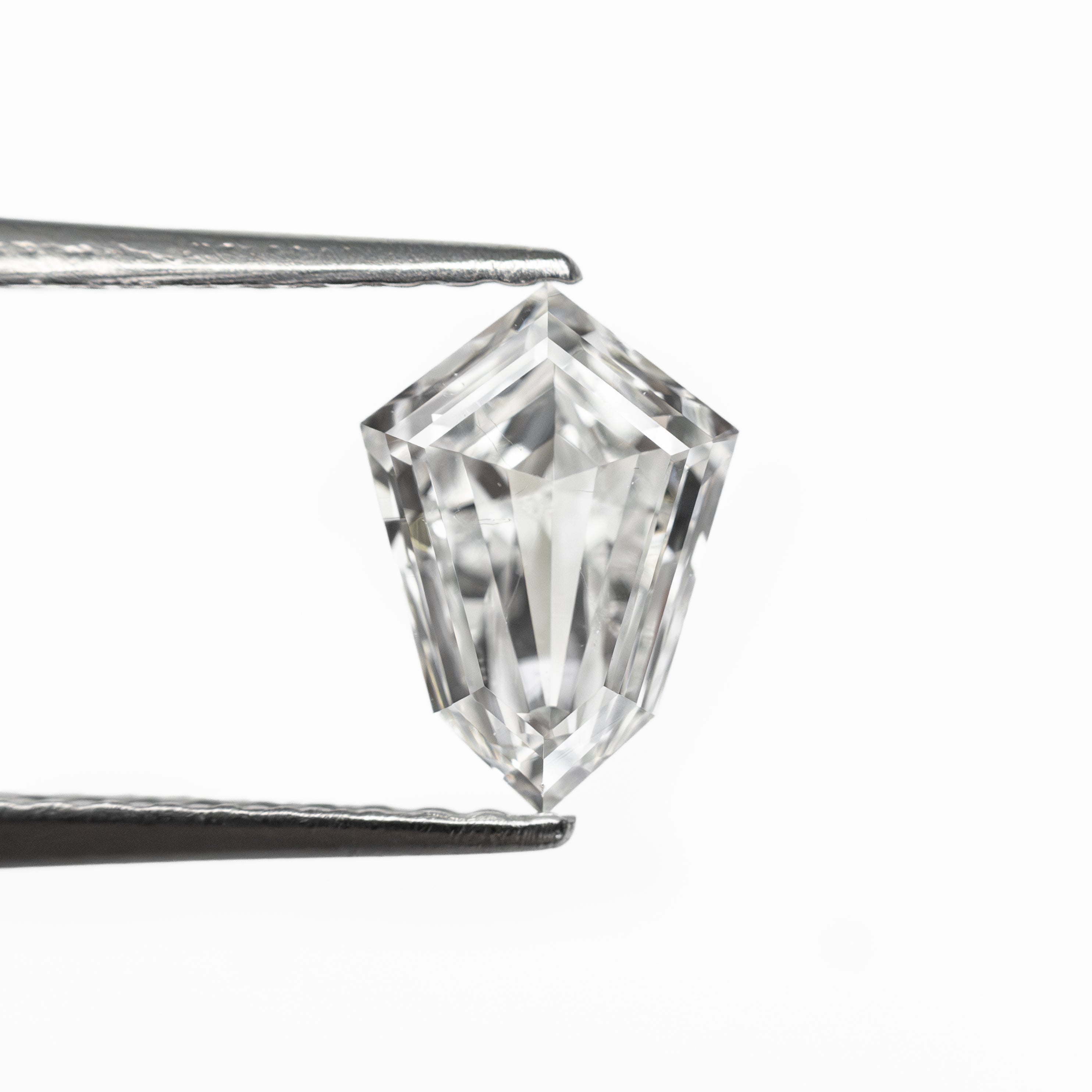 The 0.81ct 7.96x5.64x2.69mm SI1 F Kite Step Cut 19649-01 by East London jeweller Rachel Boston | Discover our collections of unique and timeless engagement rings, wedding rings, and modern fine jewellery.