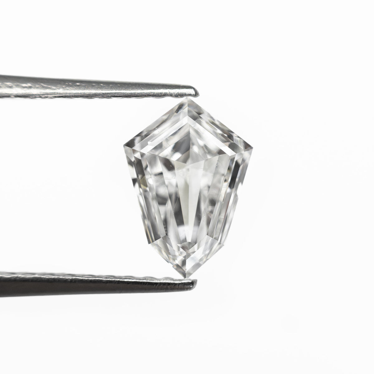 The 0.81ct 7.96x5.64x2.69mm SI1 F Kite Step Cut 19649-01 by East London jeweller Rachel Boston | Discover our collections of unique and timeless engagement rings, wedding rings, and modern fine jewellery.
