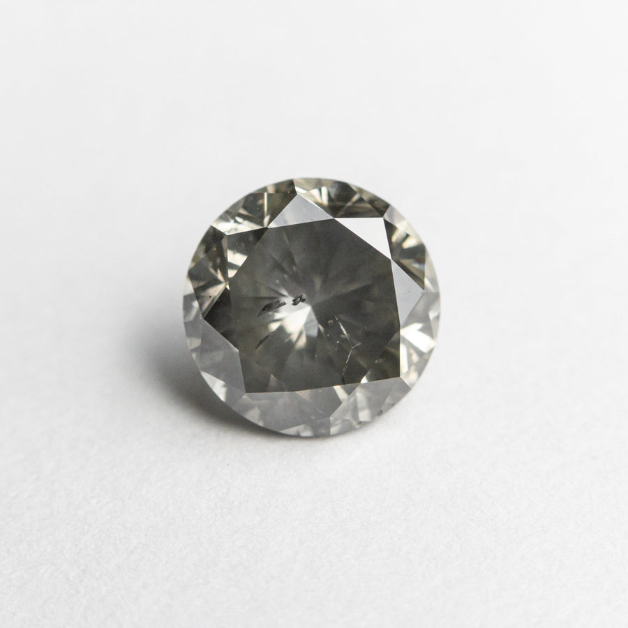 The 1.32ct 6.77x6.76x4.35mm I1 Fancy Grey Round Brilliant 19755-09 by East London jeweller Rachel Boston | Discover our collections of unique and timeless engagement rings, wedding rings, and modern fine jewellery. - Rachel Boston Jewellery