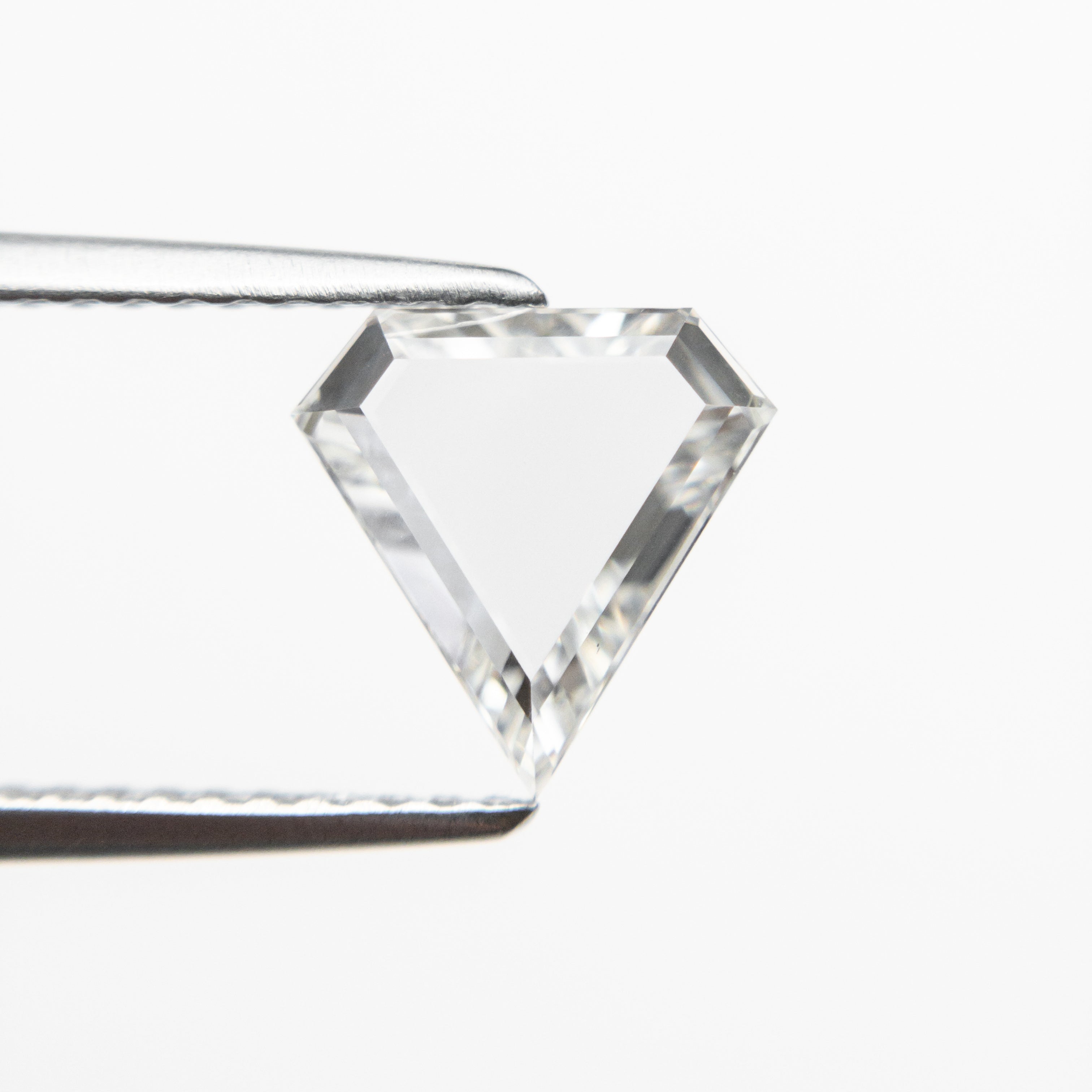 The 0.92ct 8.17x8.10x1.80mm VS1 G Shield Portrait Cut 19854-06 by East London jeweller Rachel Boston | Discover our collections of unique and timeless engagement rings, wedding rings, and modern fine jewellery.