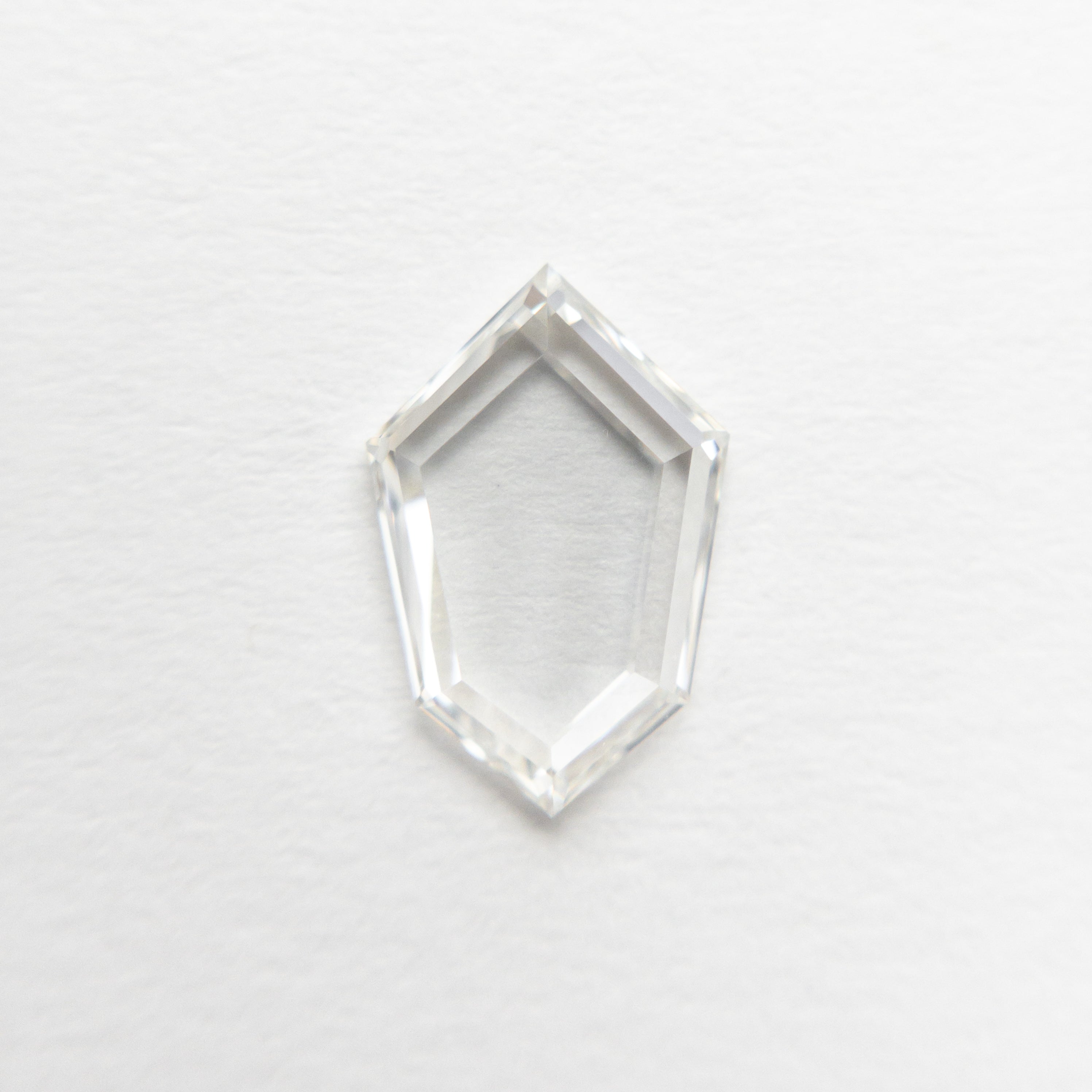 The 0.76ct 9.10x6.01x1.59mm VS2 G Kite Portrait Cut 19854-13 by East London jeweller Rachel Boston | Discover our collections of unique and timeless engagement rings, wedding rings, and modern fine jewellery.
