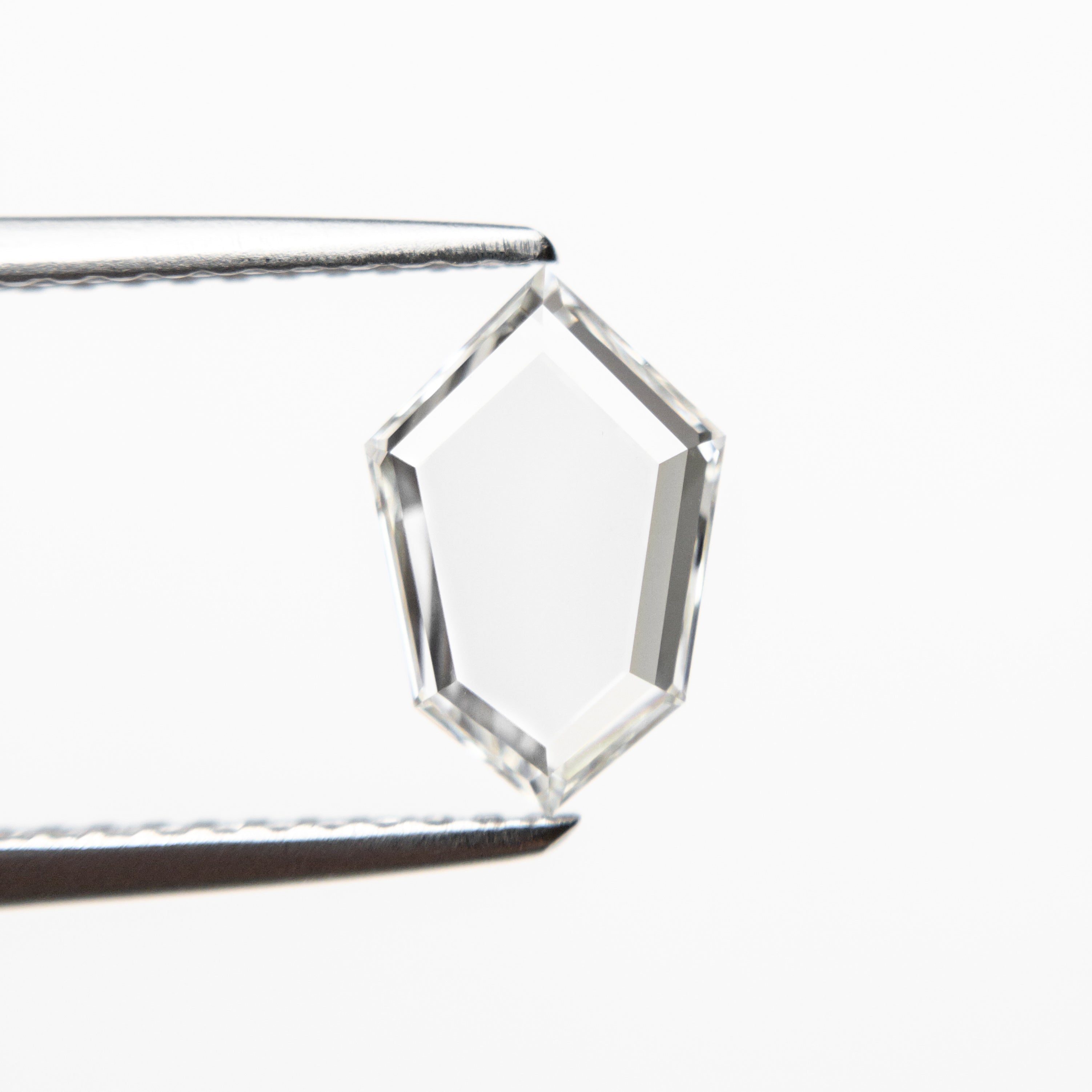 The 0.76ct 9.10x6.01x1.59mm VS2 G Kite Portrait Cut 19854-13 by East London jeweller Rachel Boston | Discover our collections of unique and timeless engagement rings, wedding rings, and modern fine jewellery.